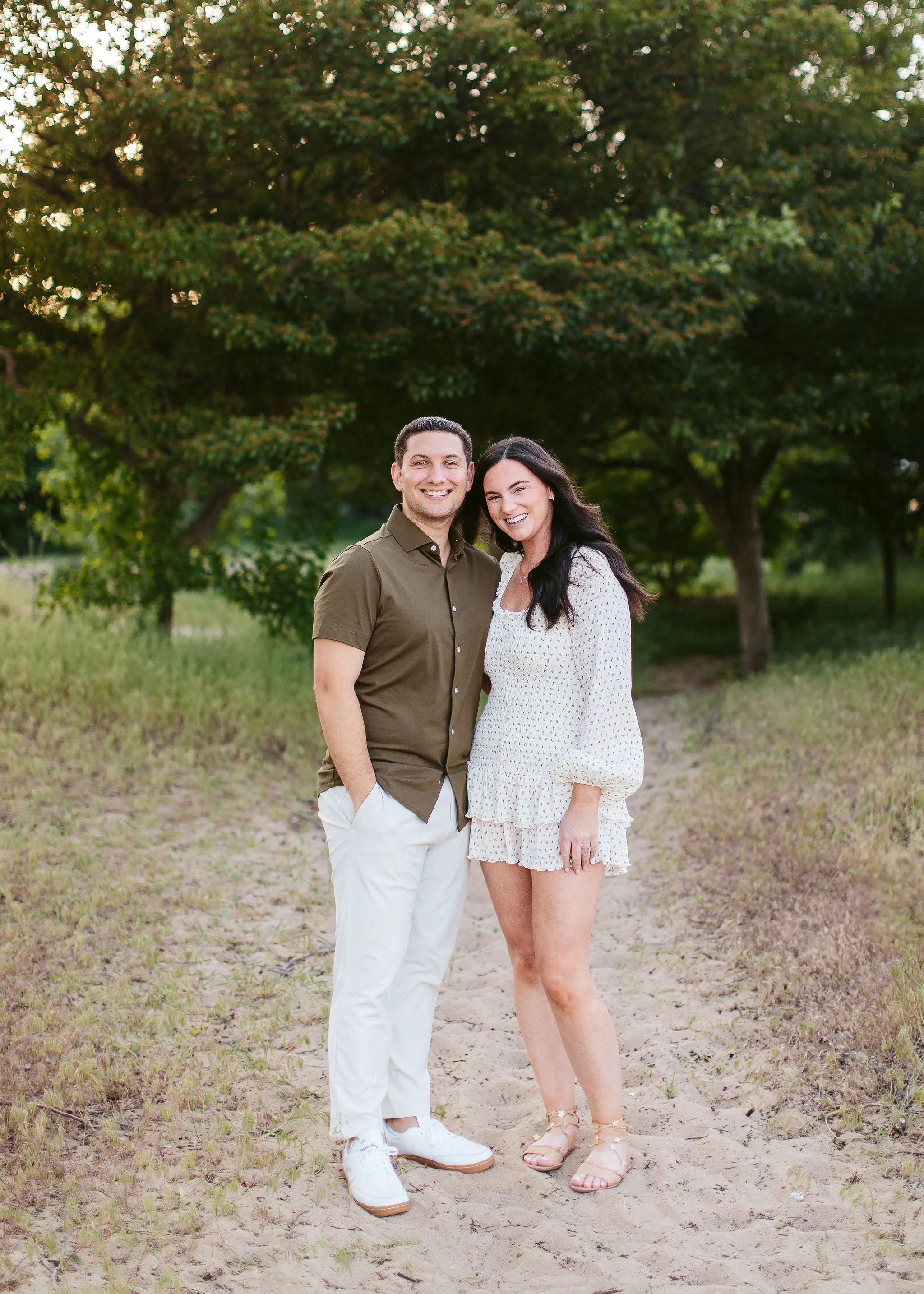 Couple smiling at camera during their Chicago engagement session