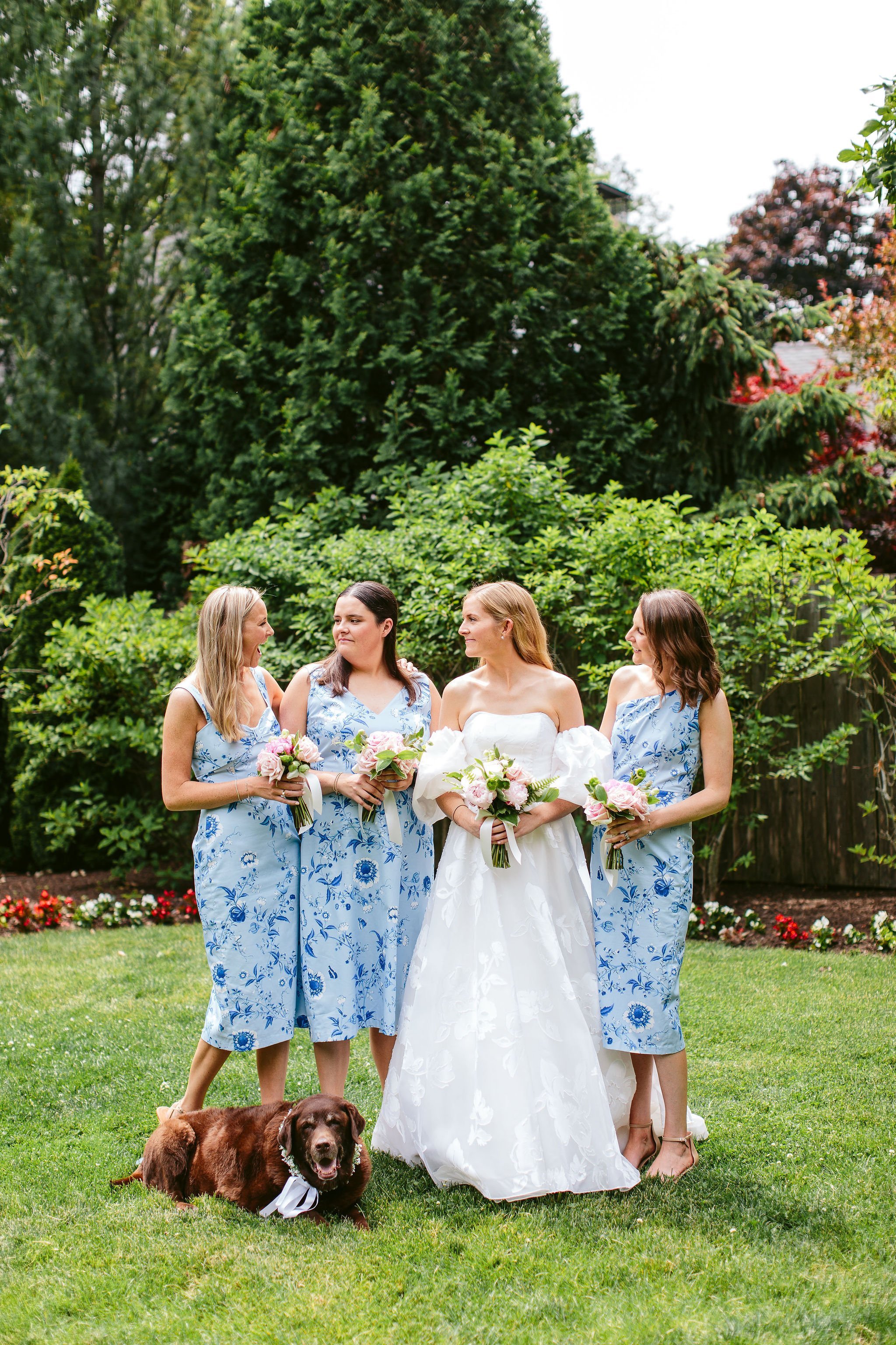 Bridal party laughter captured by a Lake County wedding photographer at a Shoreacres wedding