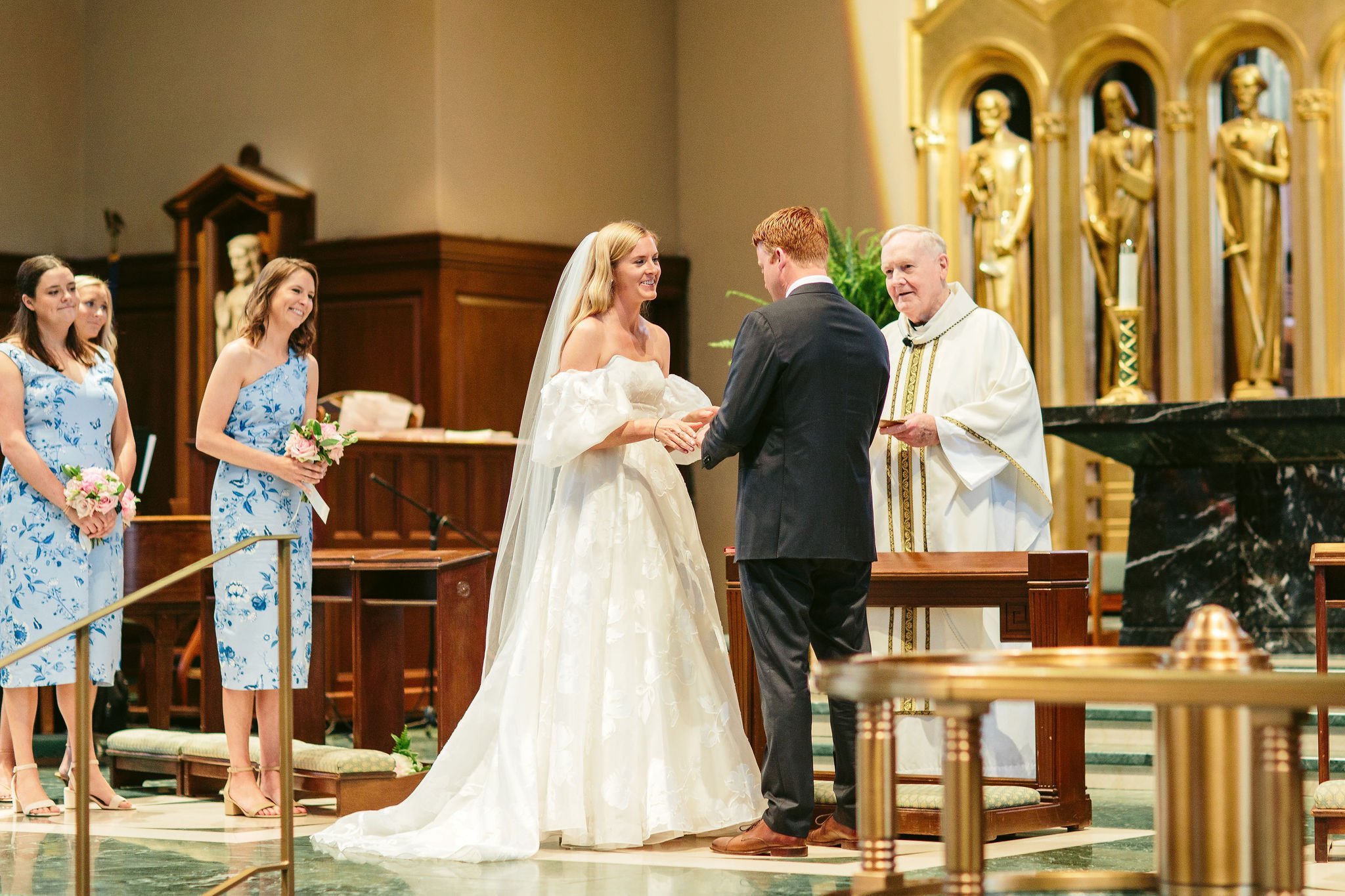 Elegant wedding ceremony at Saints Faith, Hope, and Charity Church