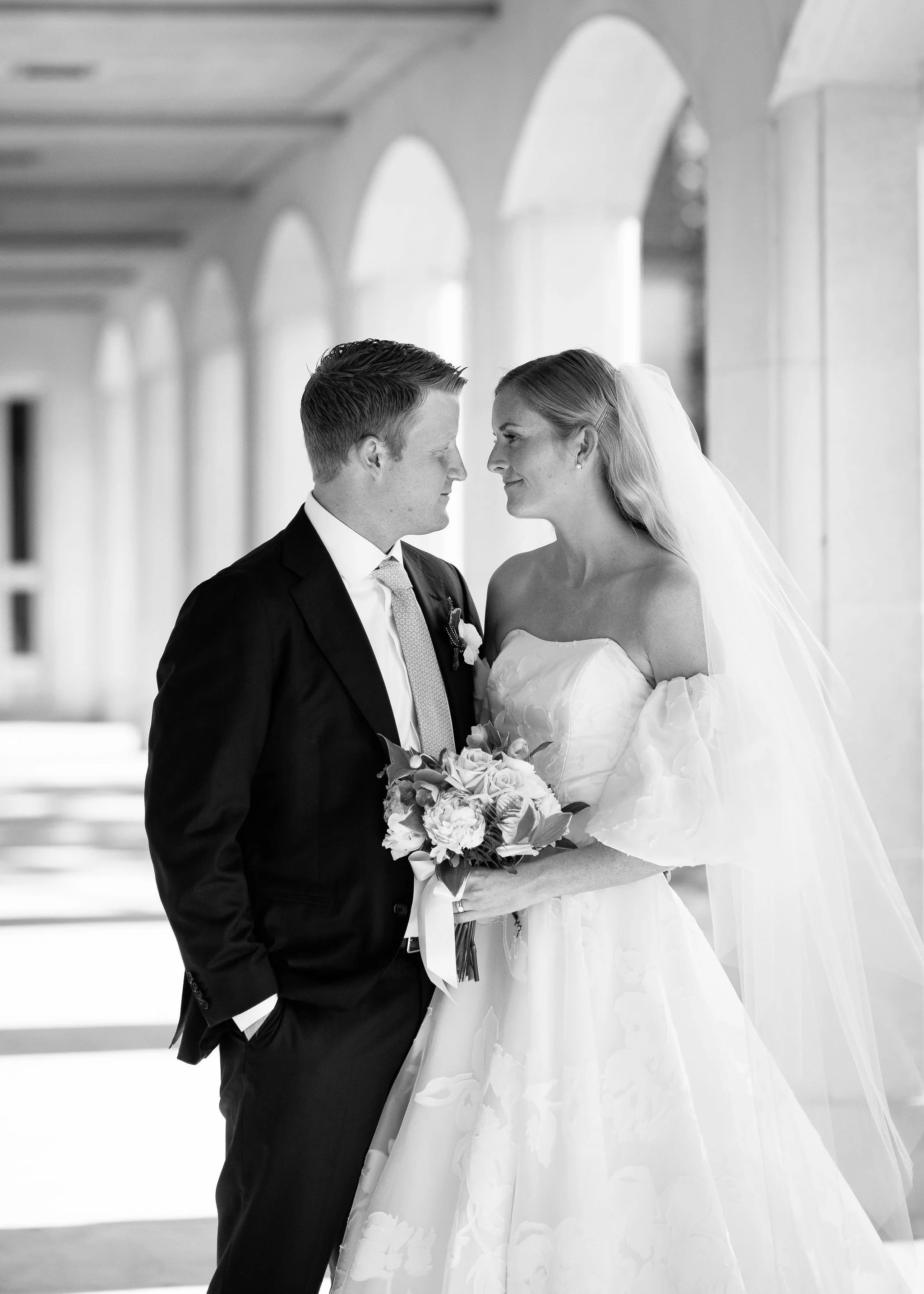 Wedding portrait of bride and groom at Saints Faith, Hope, and Charity church