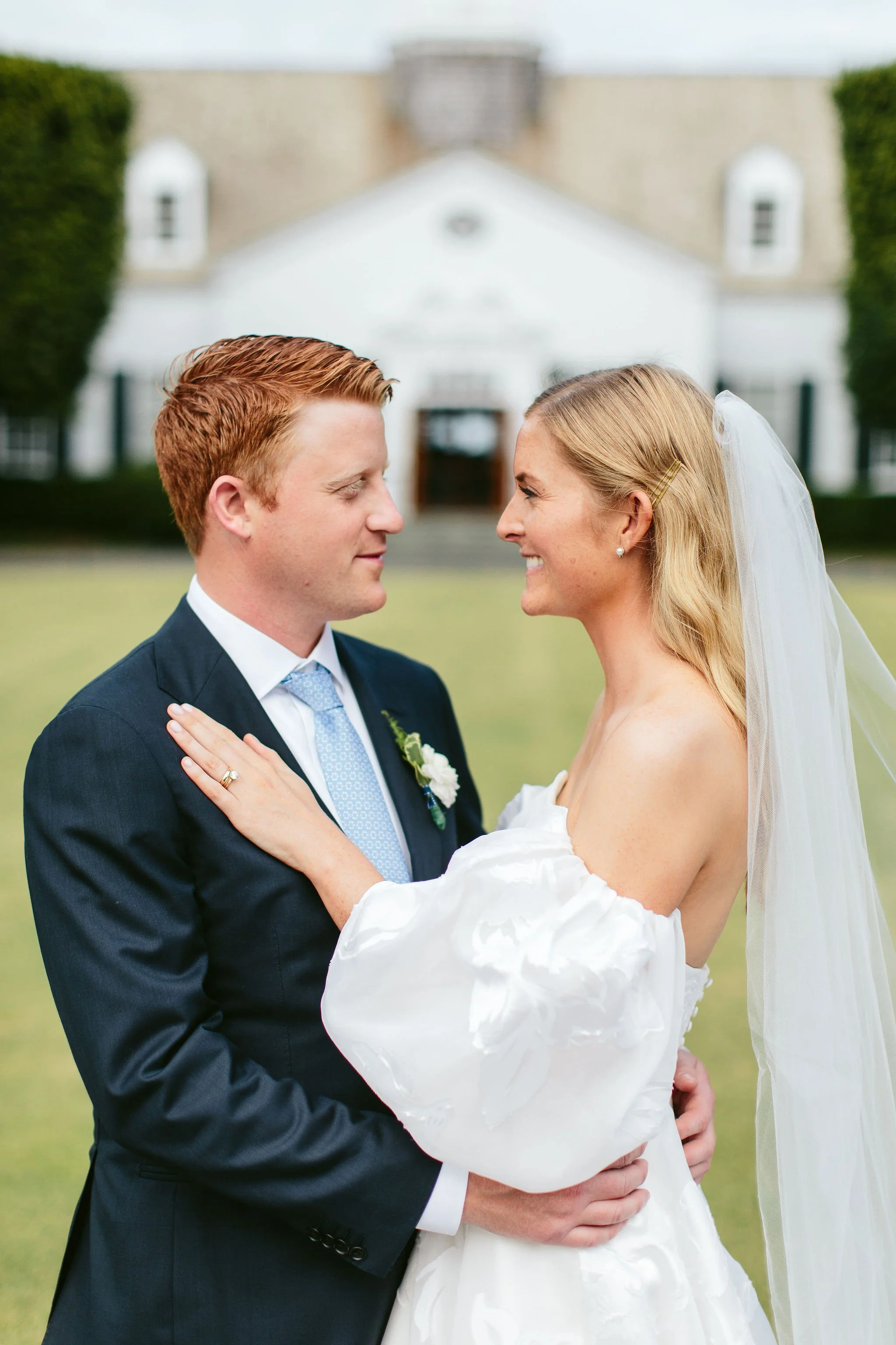 Bride and groom sharing a moment in Lake Bluff, photographed by a Lake Bluff wedding photographer
