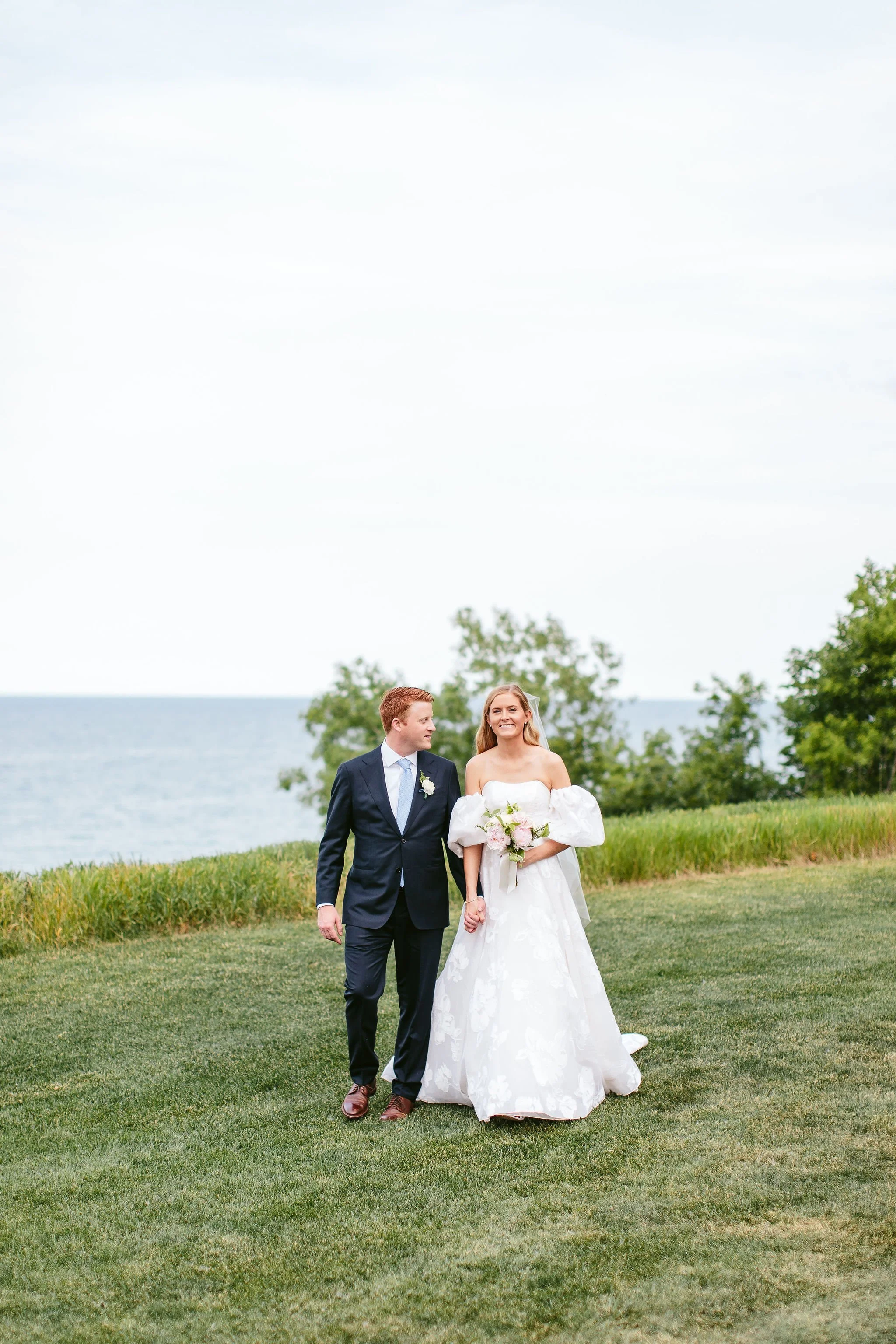 Couple's romantic stroll by the Lake Michigan at Shoreacres