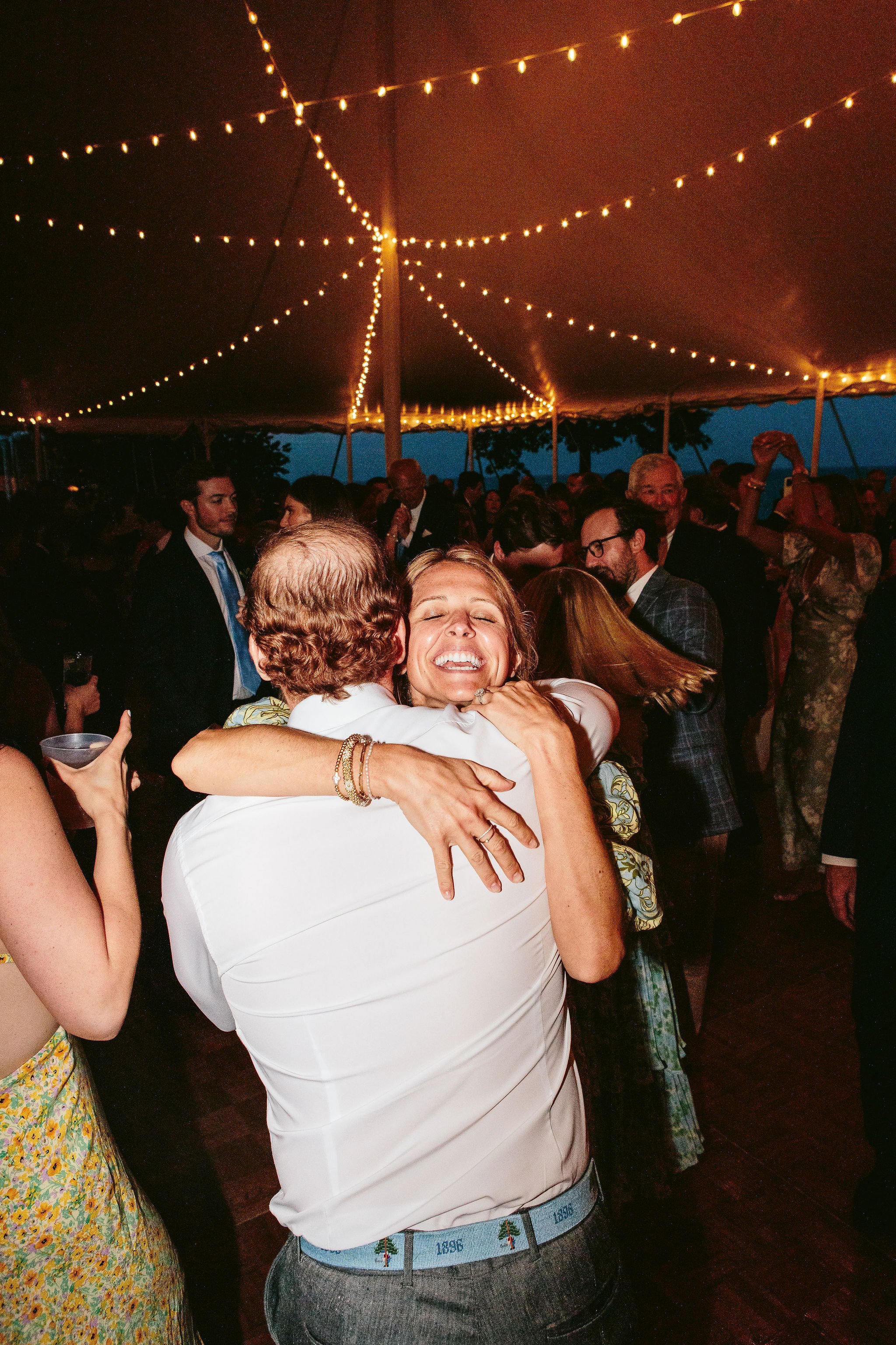 Joyful reception moments in Lake Bluff at Shoreacres Club.