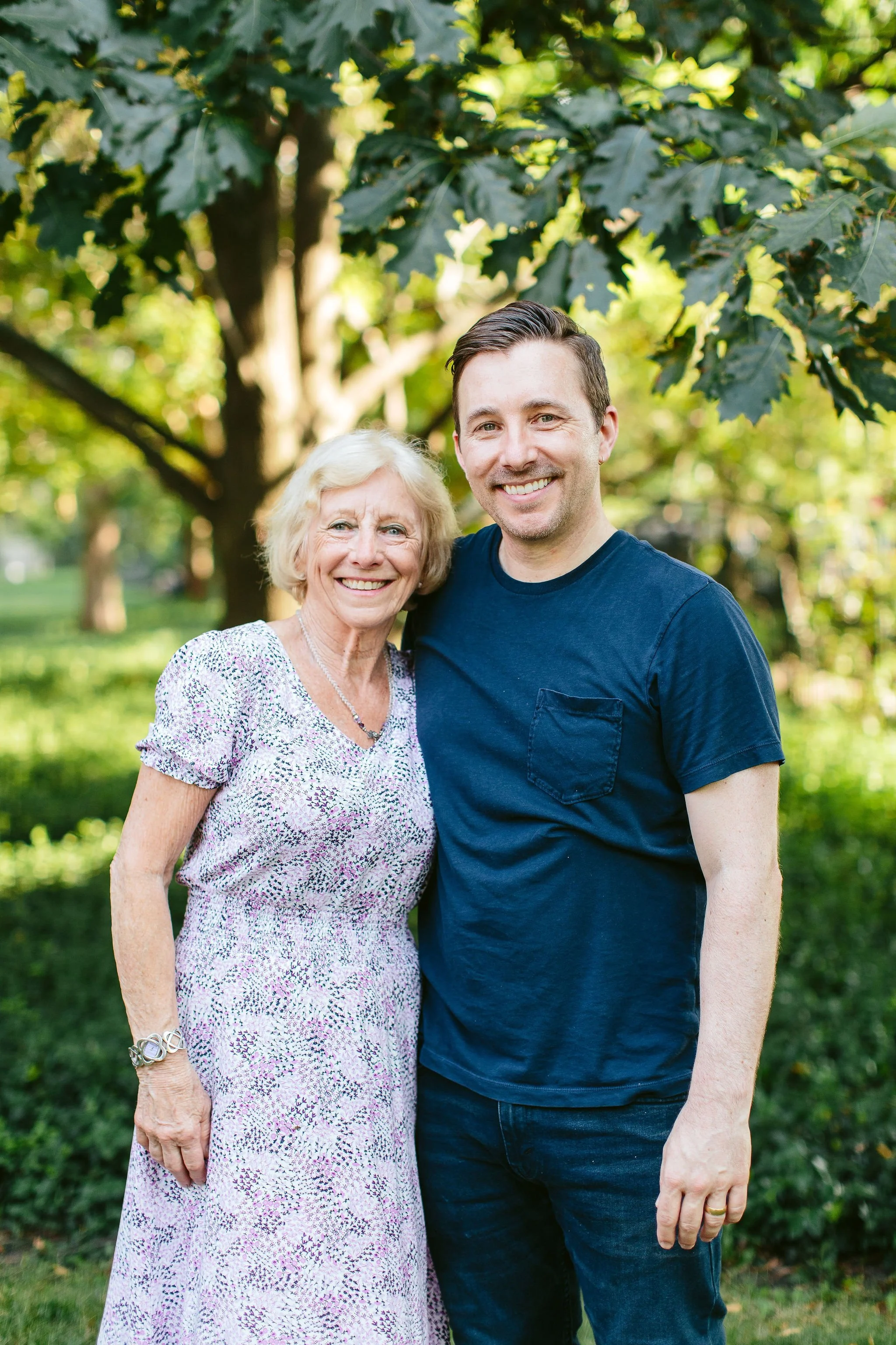 A mother poses with her adult son for a portrait session in Oak Park, IL