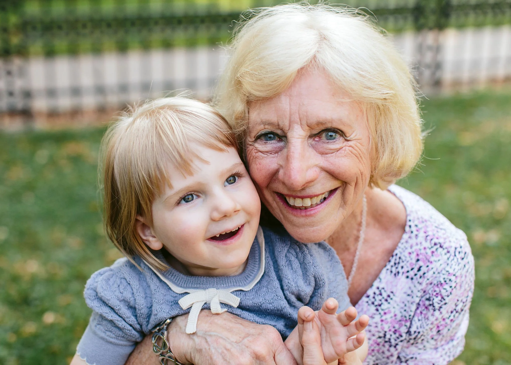 grandmother takes a photo with her granddaughter in Oak Park, IL