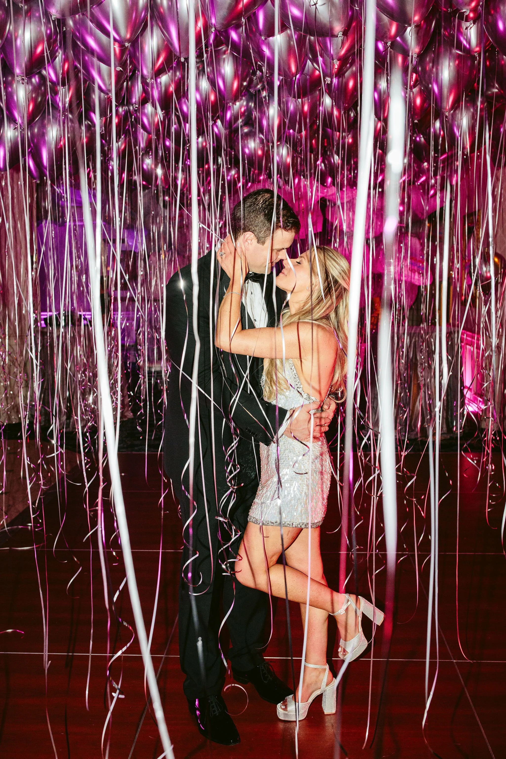 bride and groom portrait wtih streamers