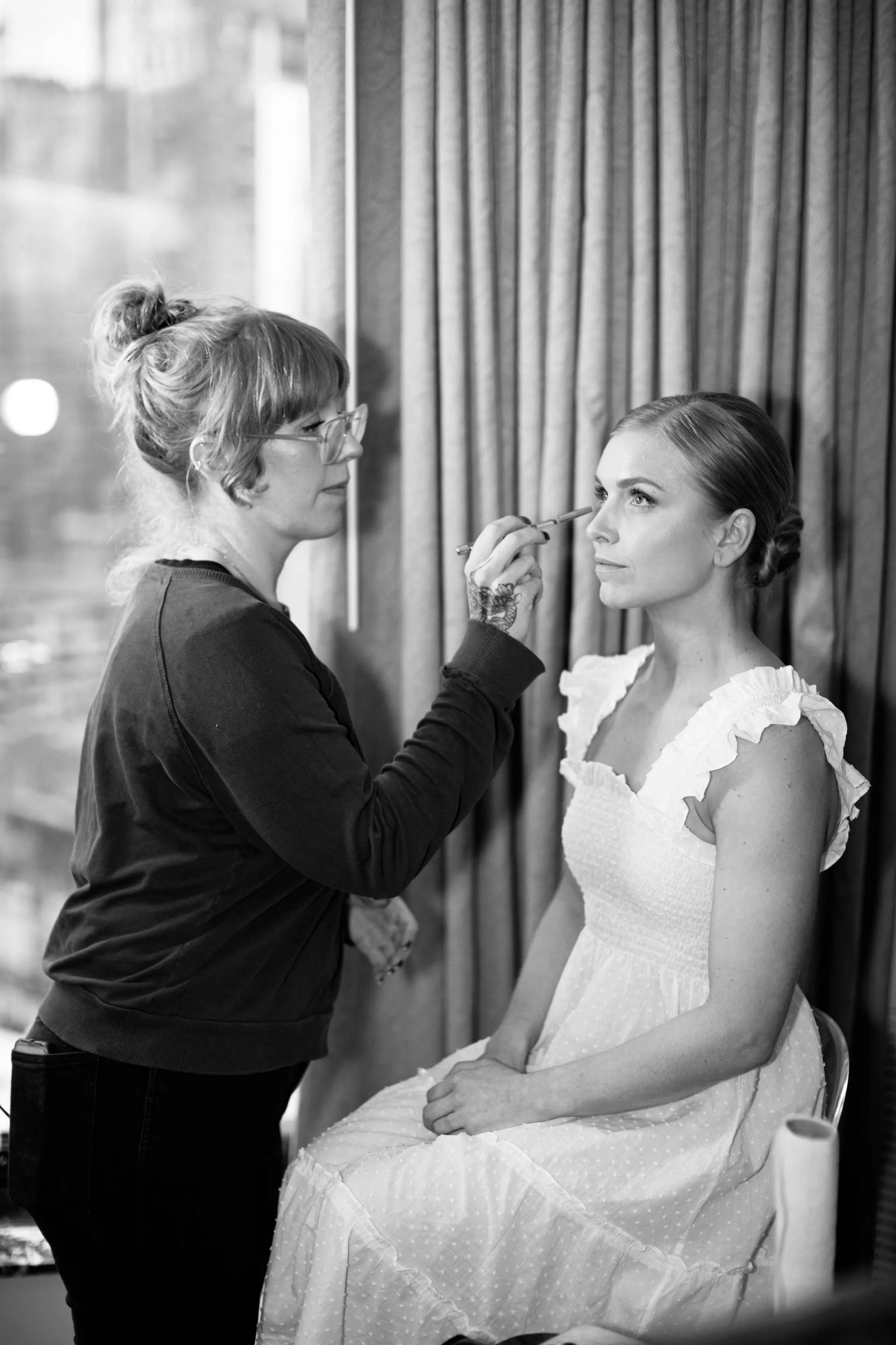 bride getting ready on wedding day morning