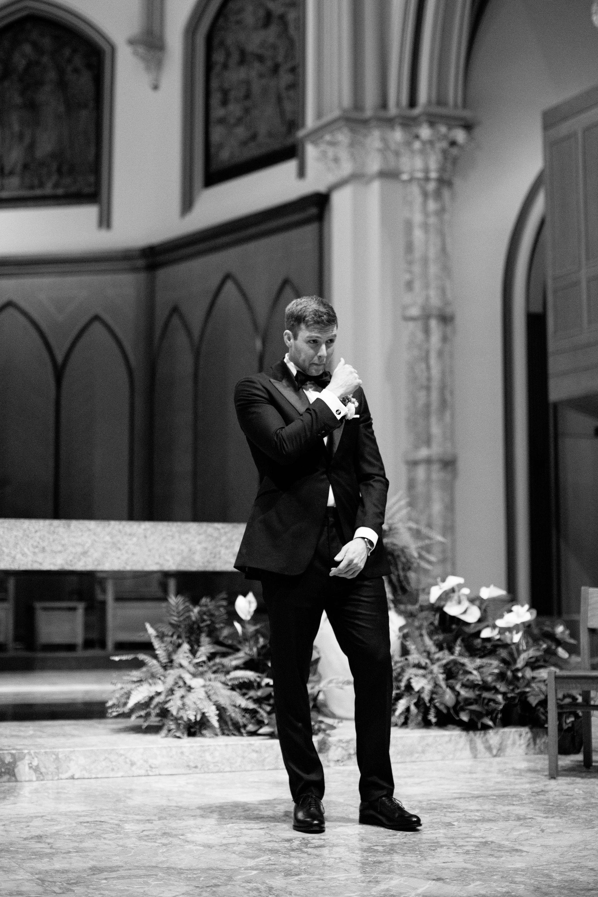 groom crying at wedding