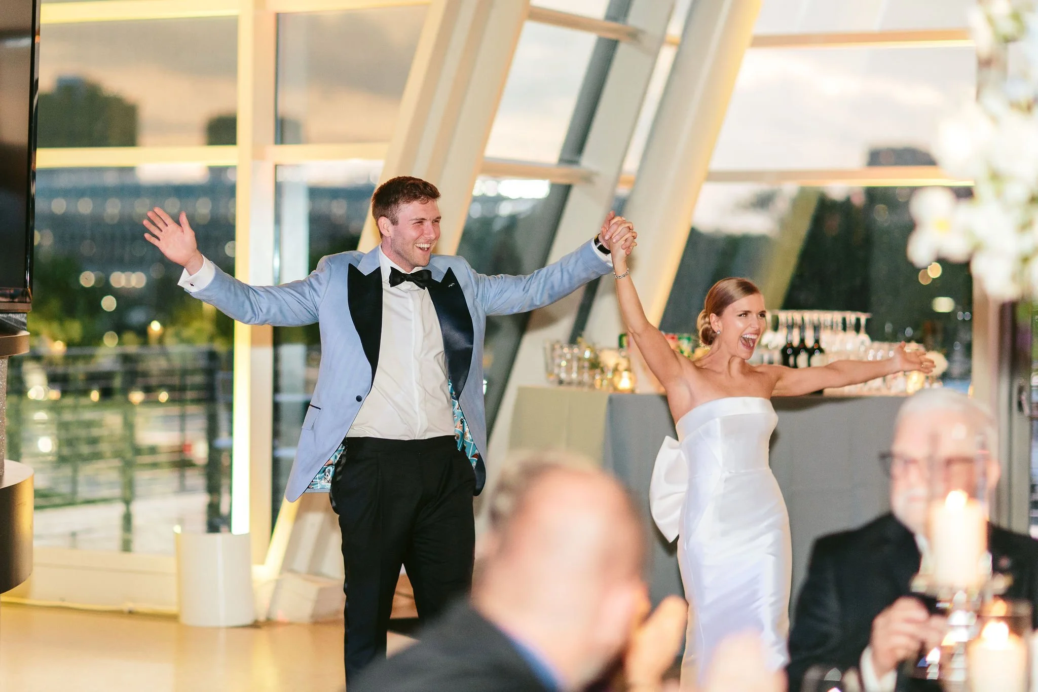 bride and groom entrance at adler planetarium wedding