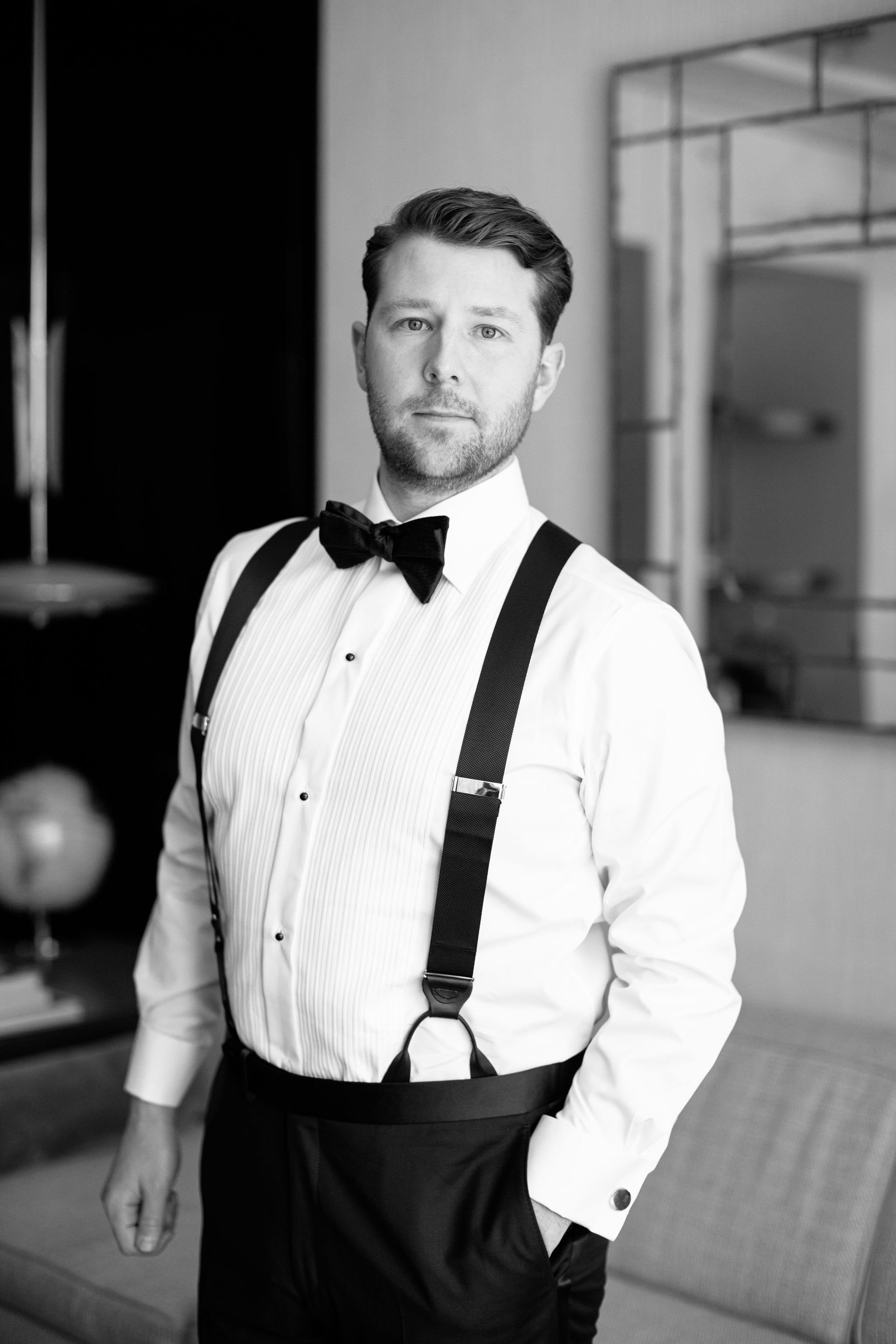 black and white groom portrait