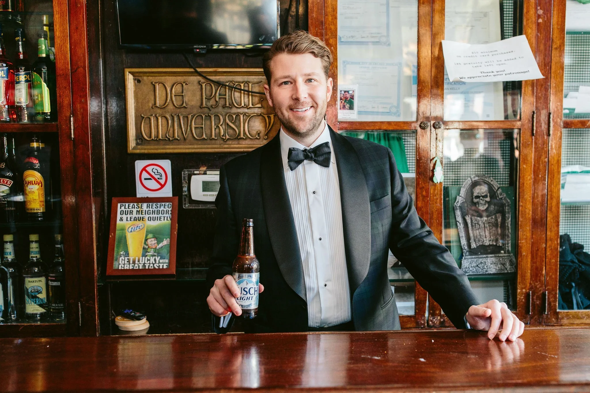 groom photo at bar