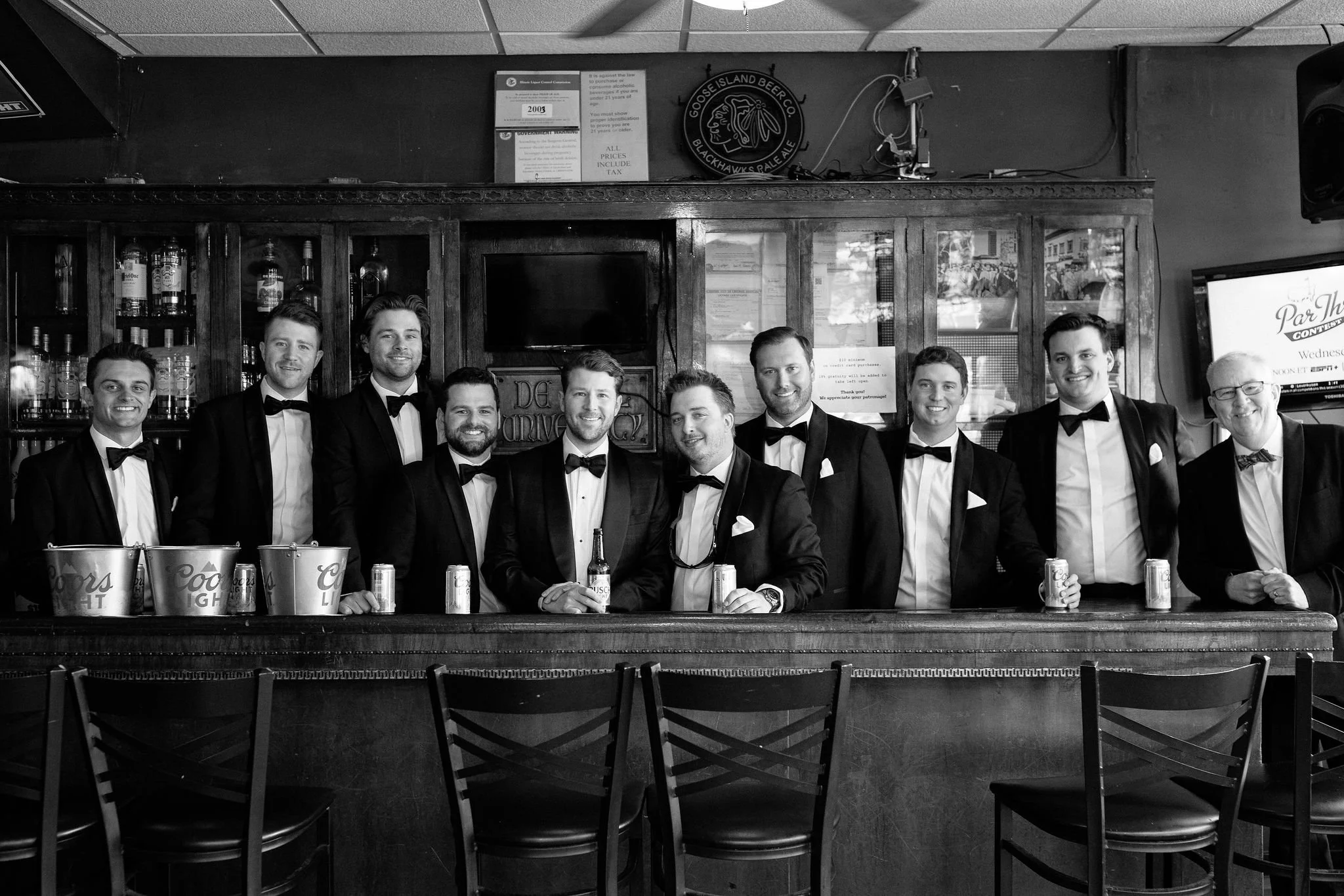 groomsmen photo at bar