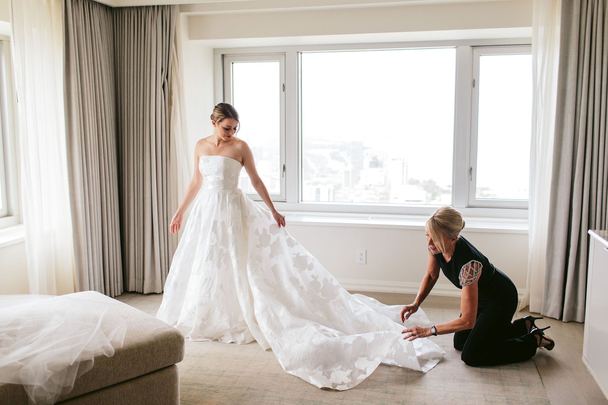 bride putting on wedding dress chicago wedding