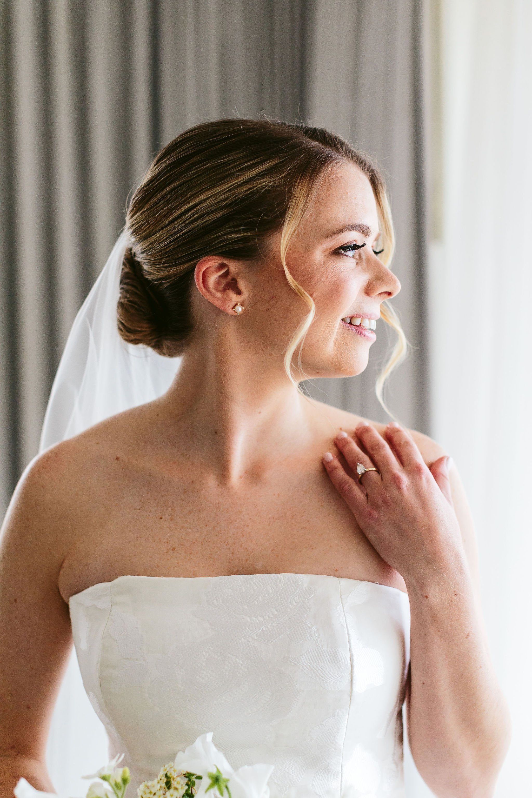 closeup portrait of bride in hotel room