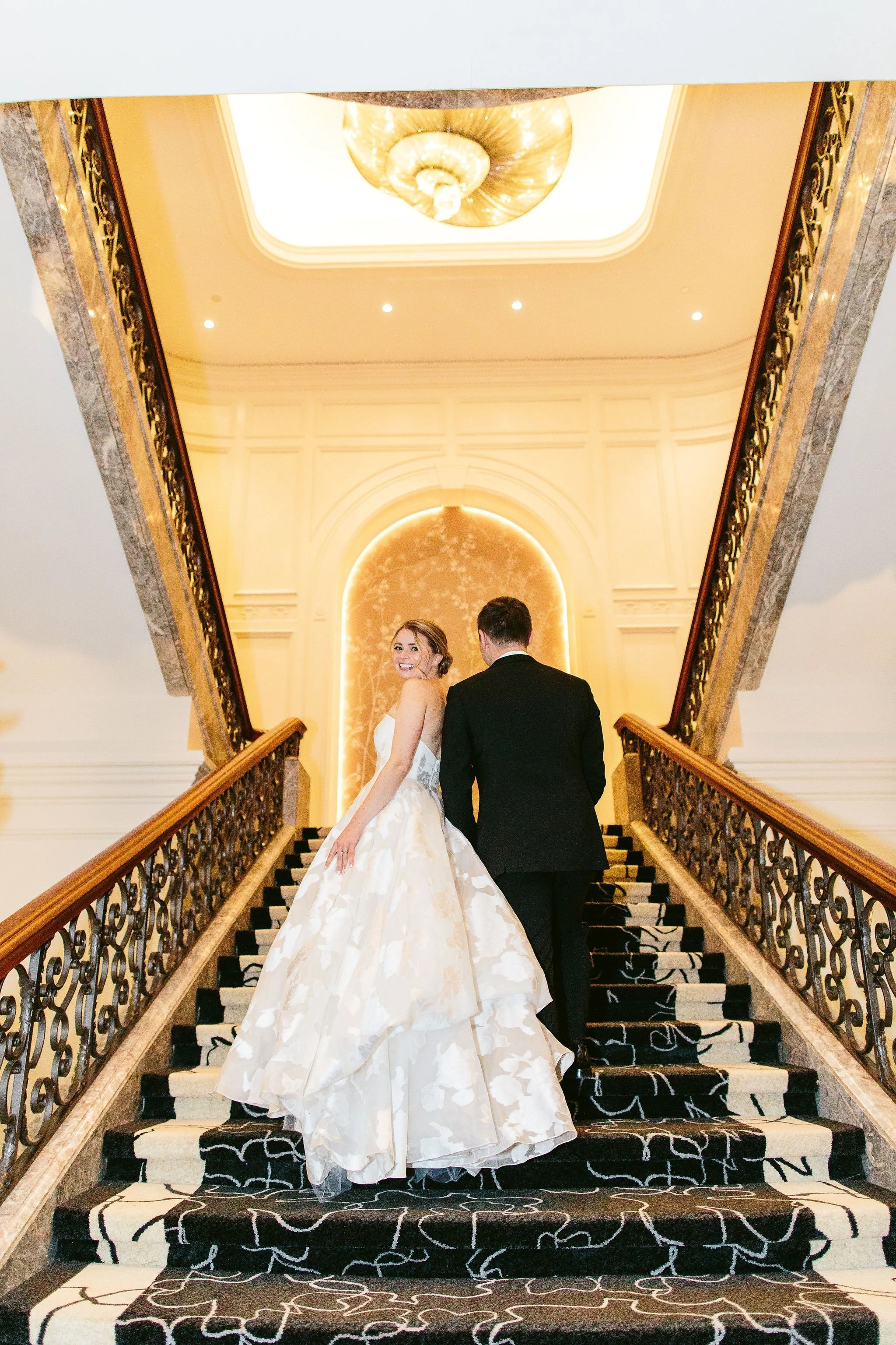 wedding portrait on stairs at four seasons chicago
