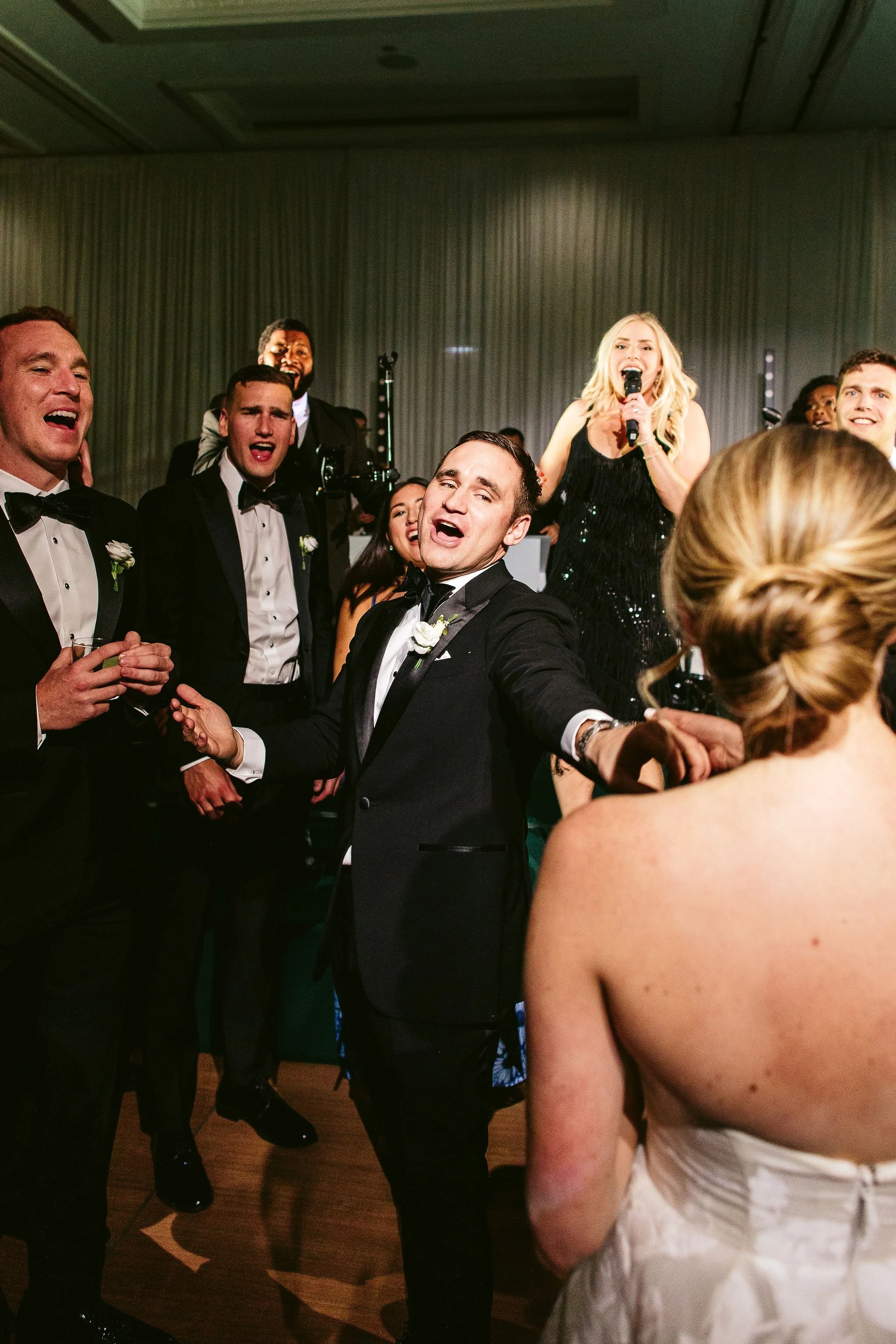 groom at reception at four seasons chicago