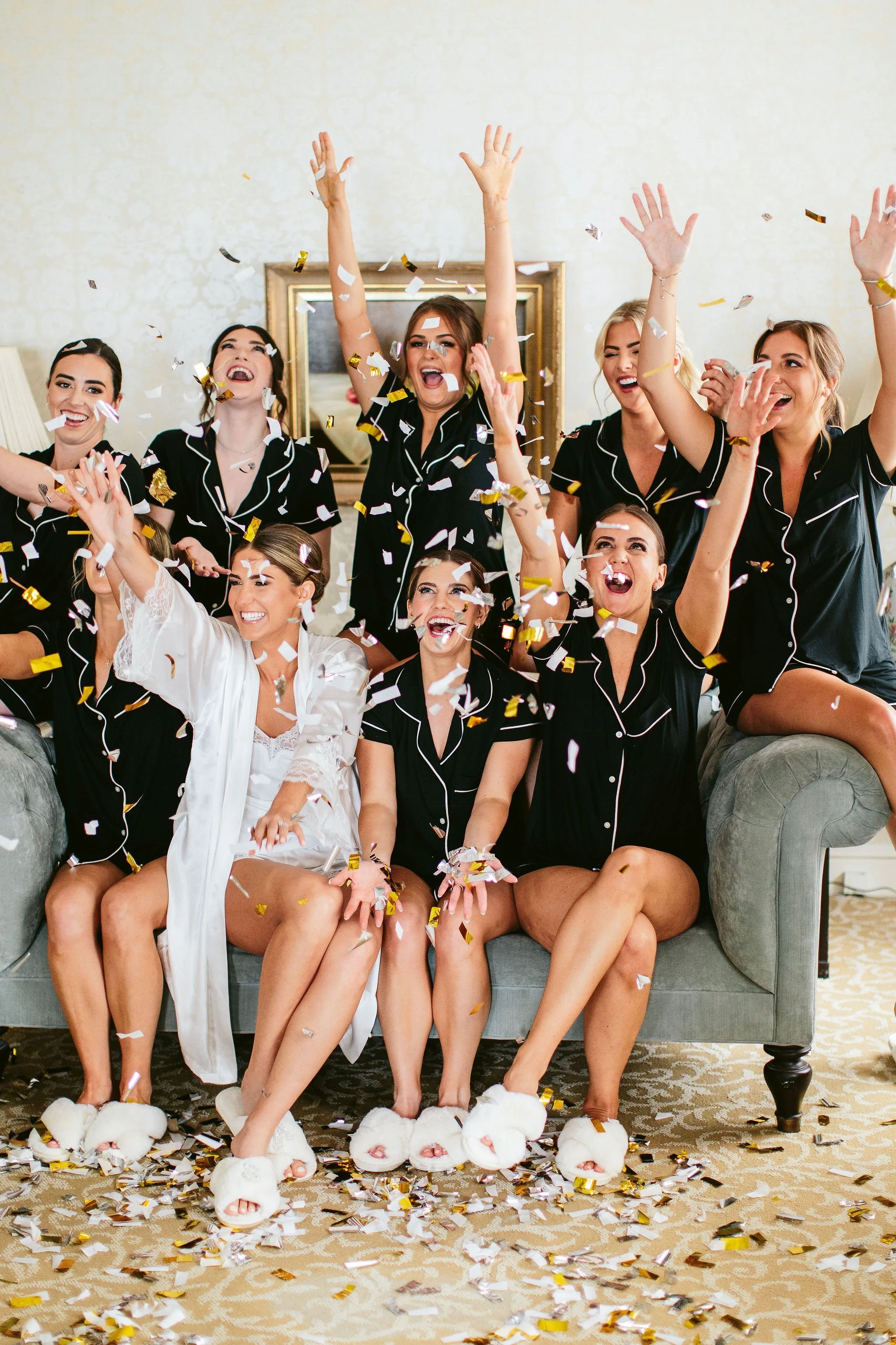 bridal party throwing confetti
