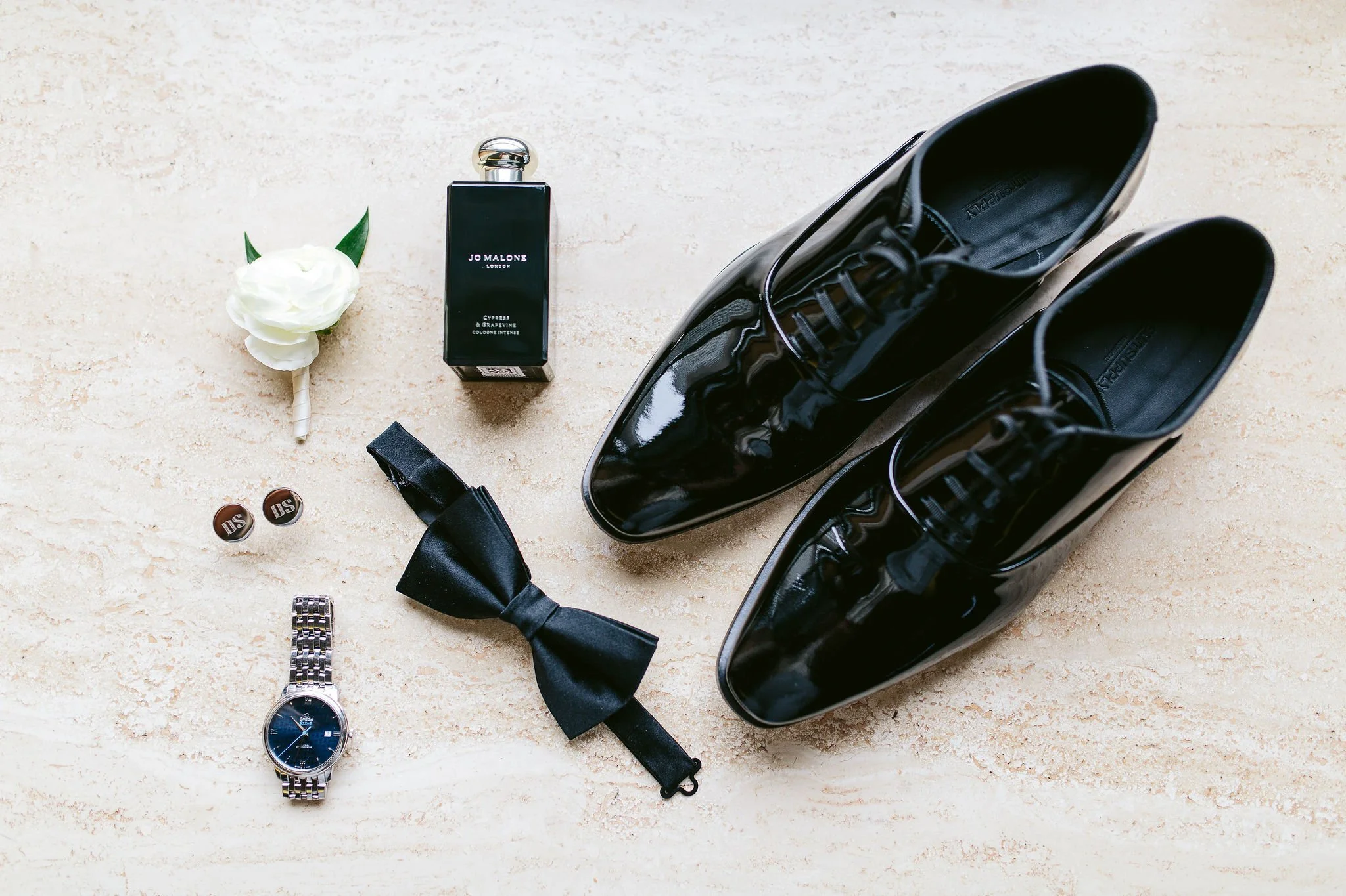 groom details at the drake