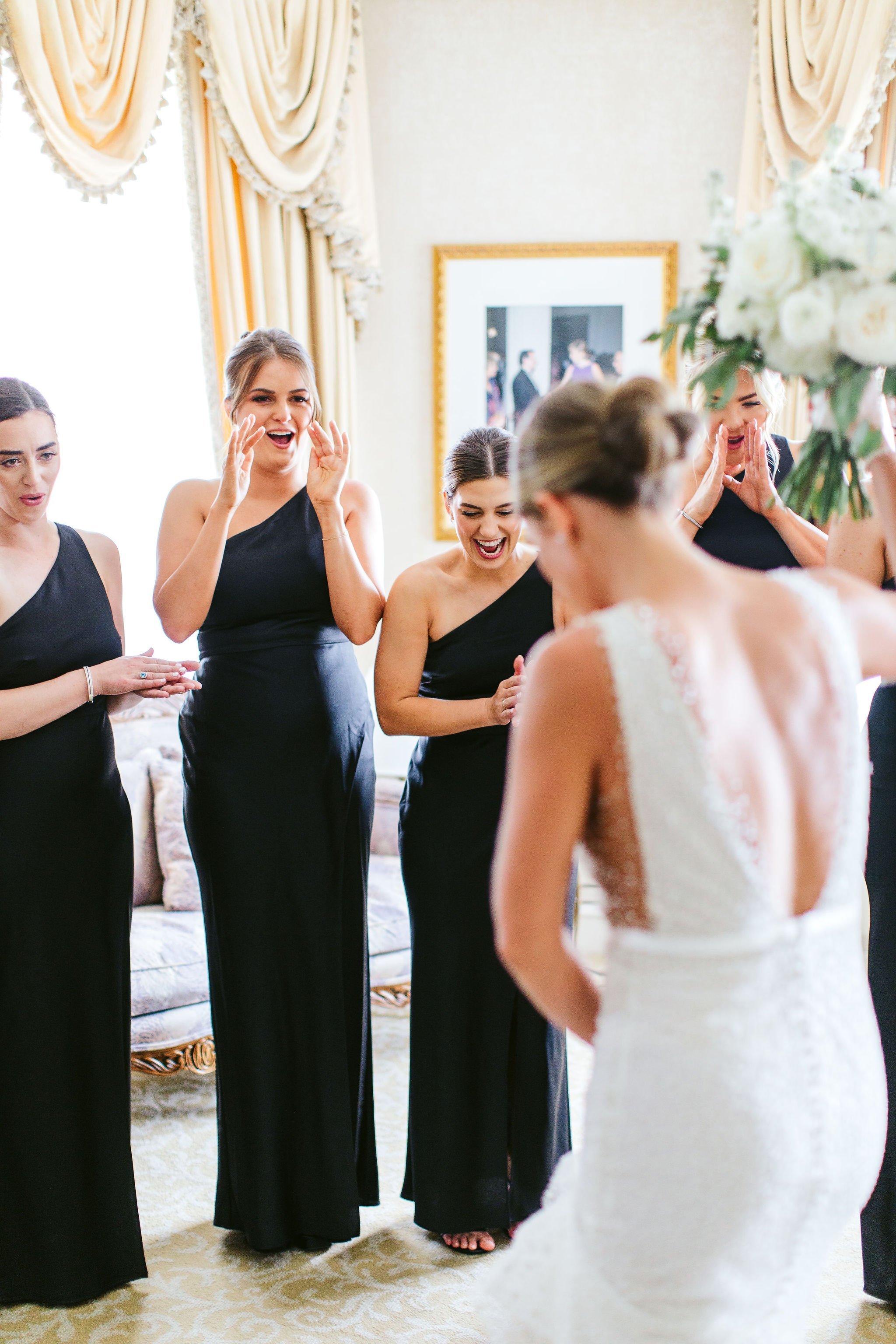 bridesmaids seeing the bride at the drake hotel