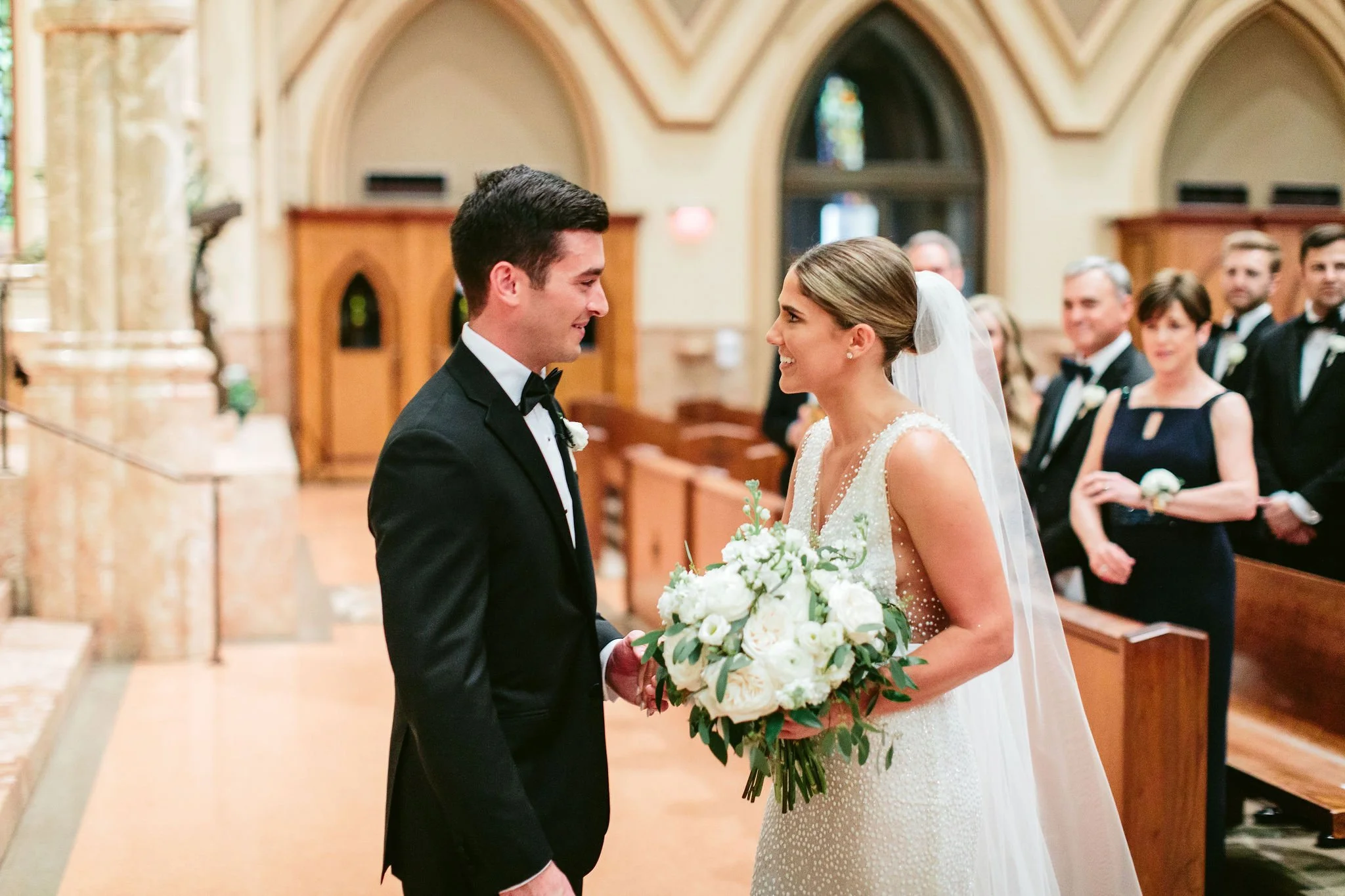 bride and groom on the altar
