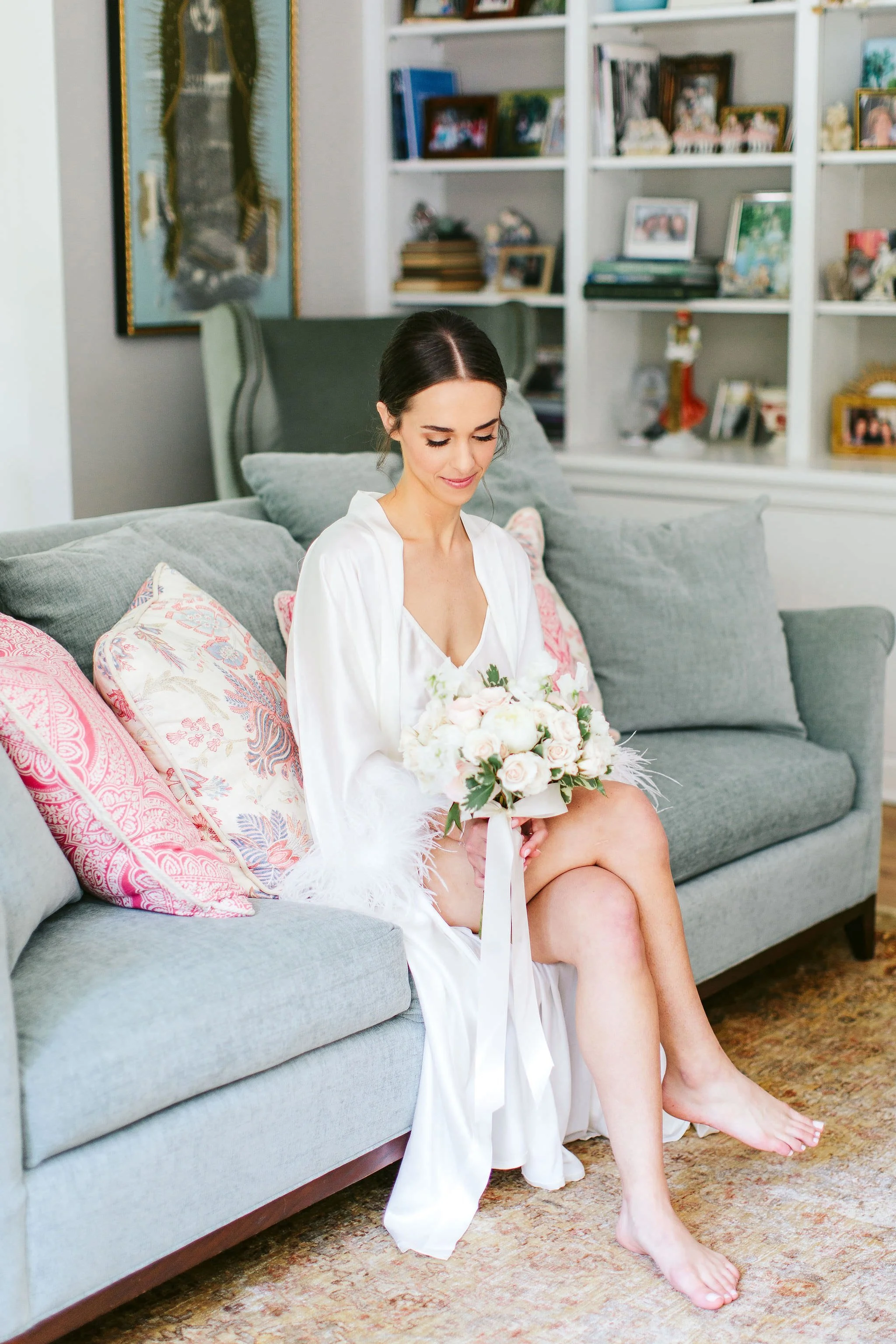 bride with floral arrangement