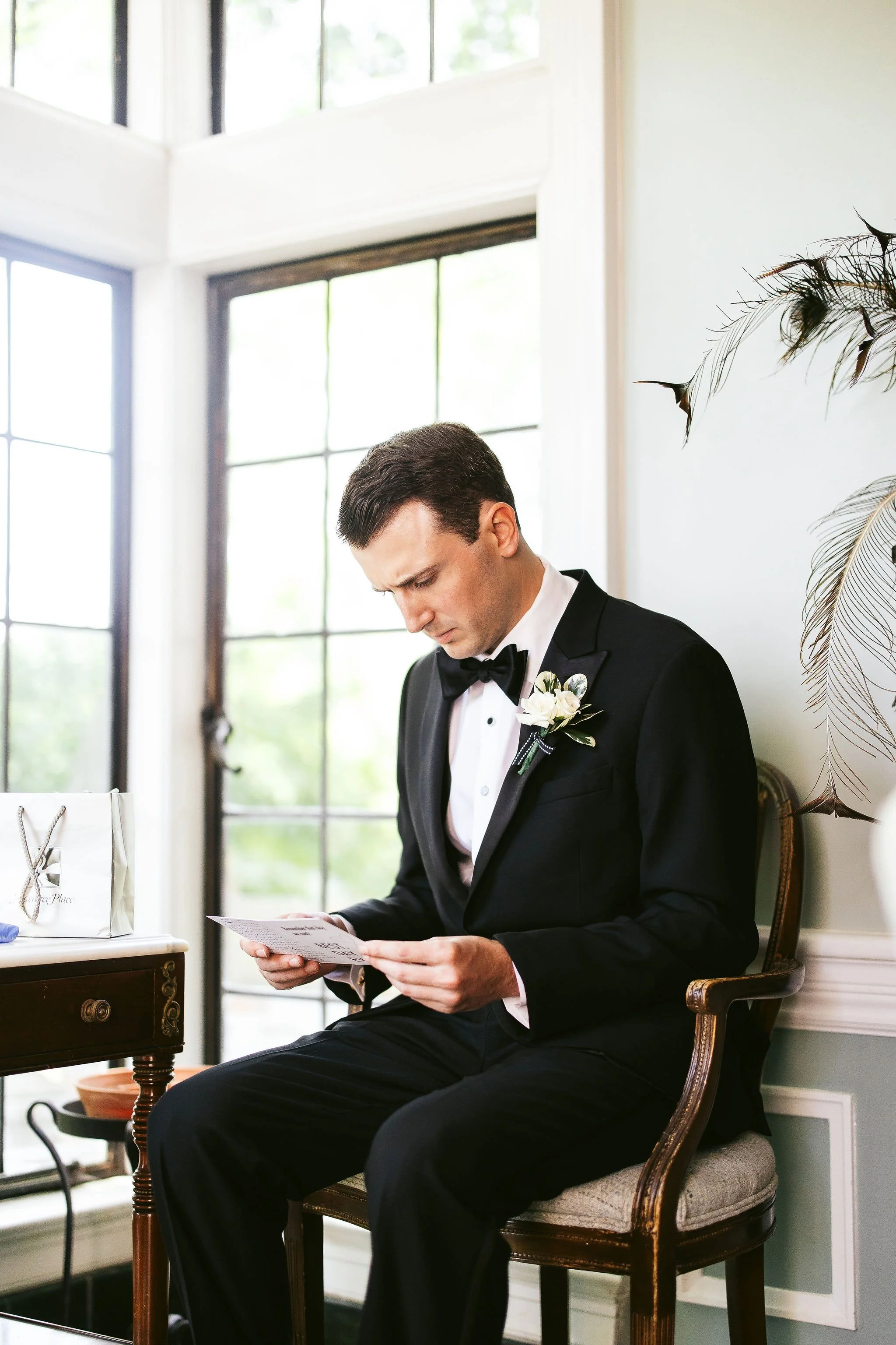groom reading card