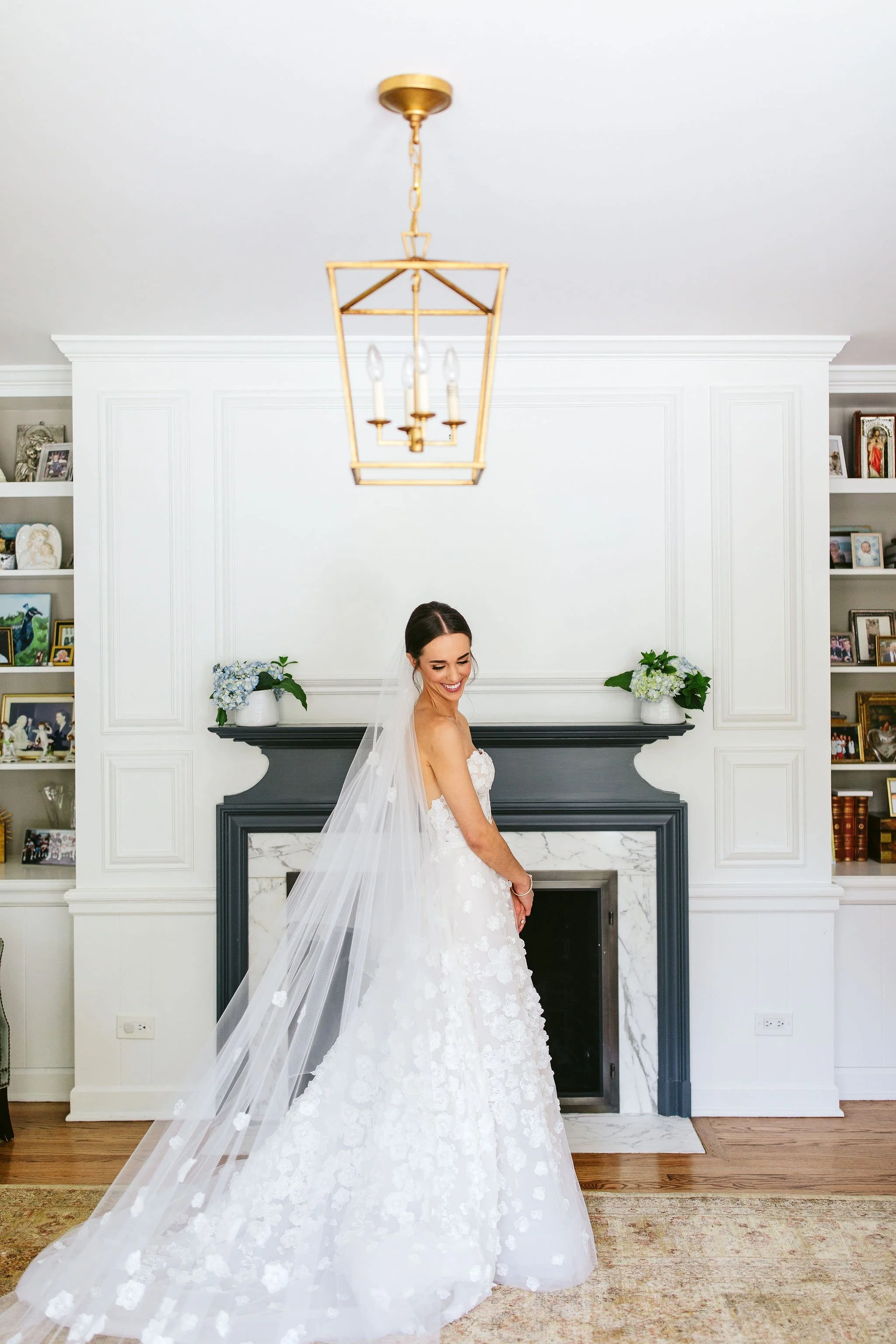 bride in front of fireplace