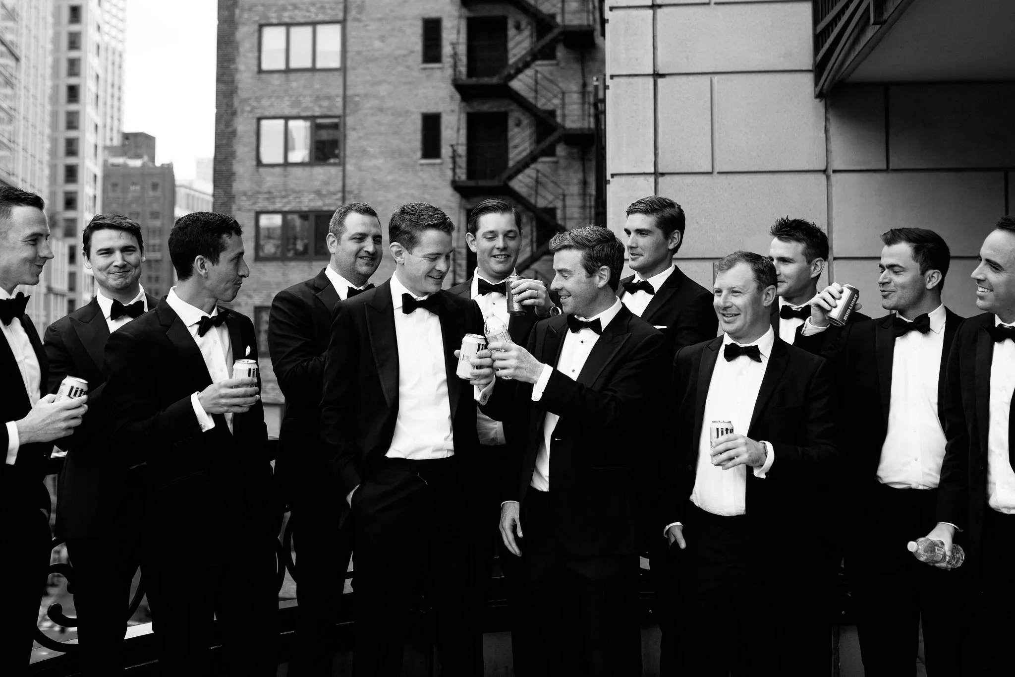groomsmen on chicago balcony