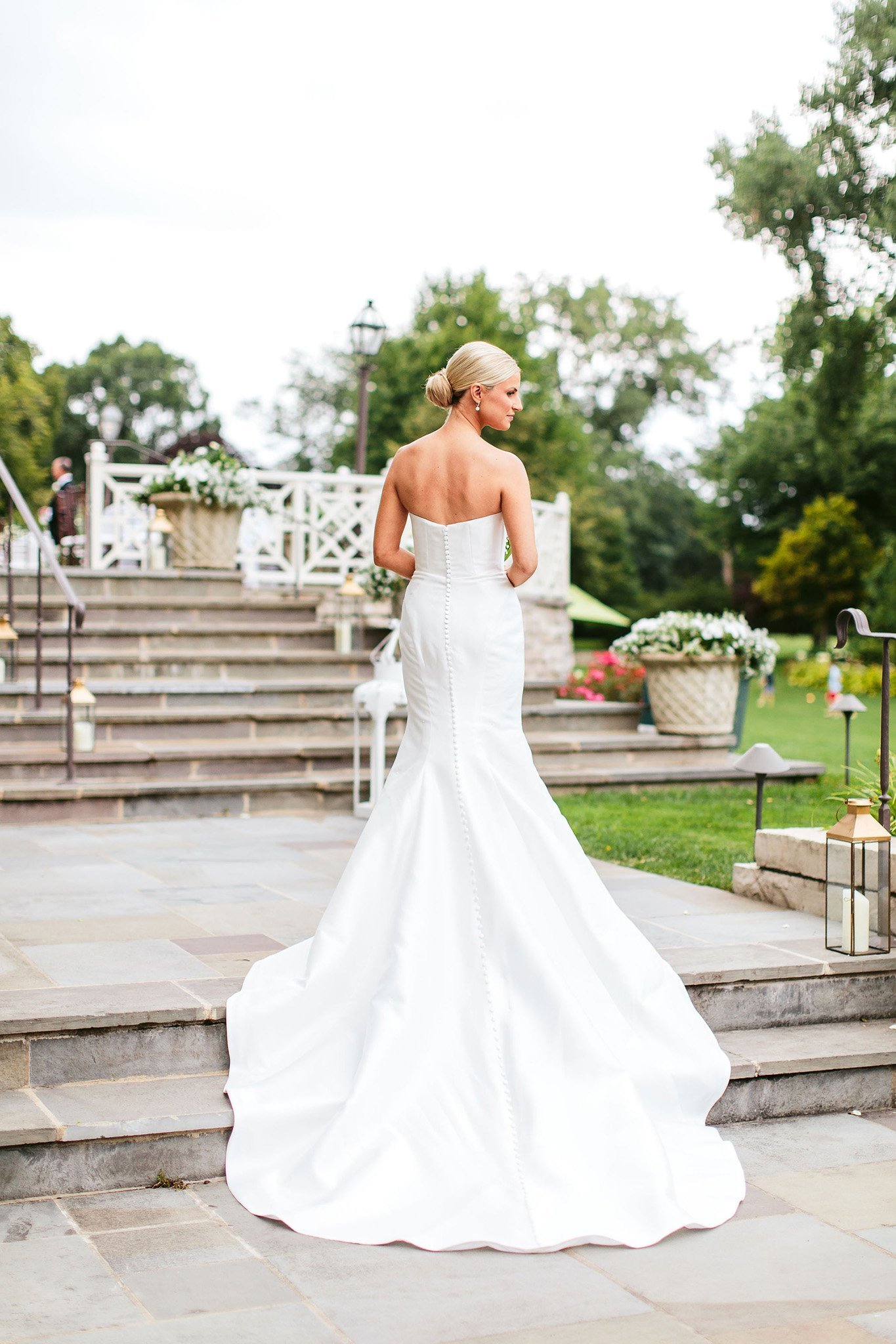 bridal portrait on stairs at saddle &amp; cycle club