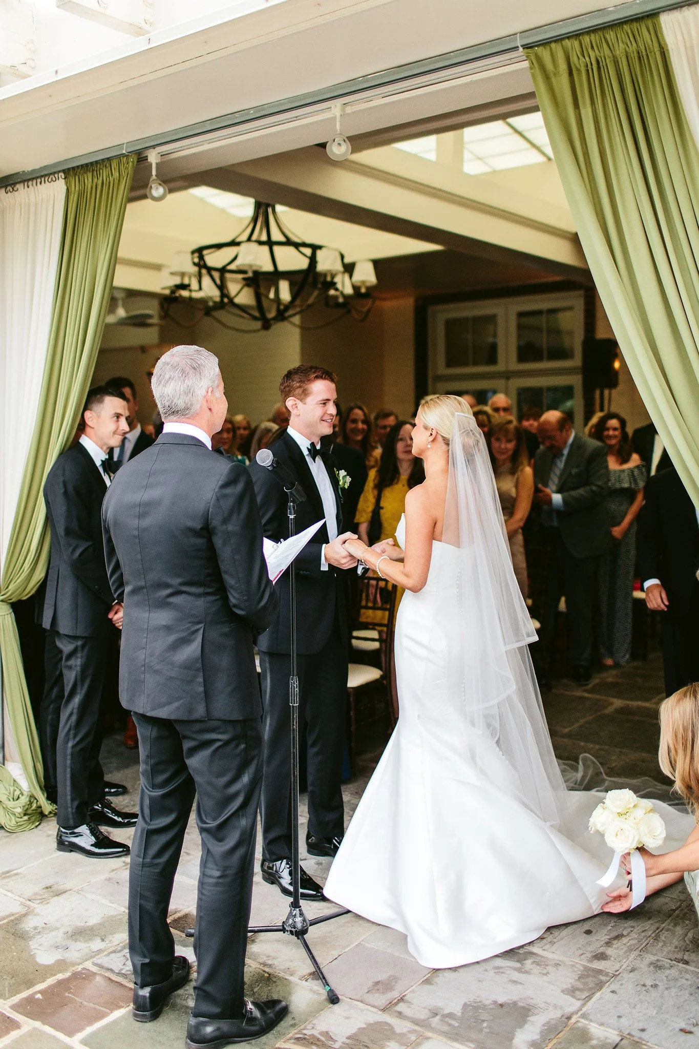 rainy wedding day at saddle &amp; cycle club