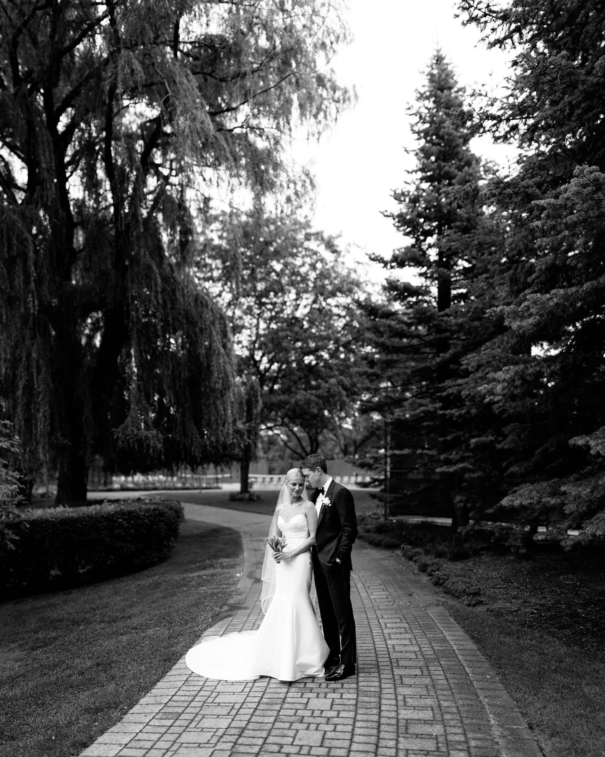 black and white wedding photo at saddle &amp; cycle club