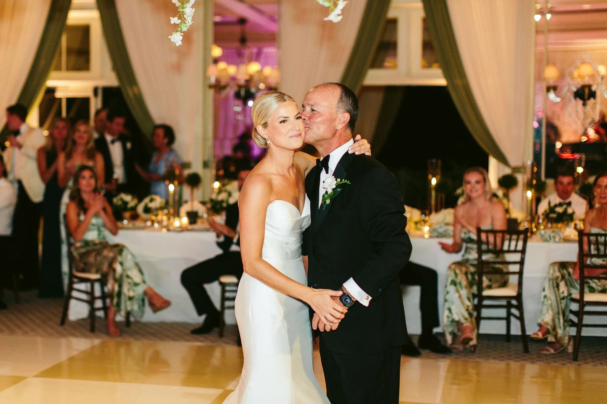 father and daughter dance at saddle &amp; cycle club