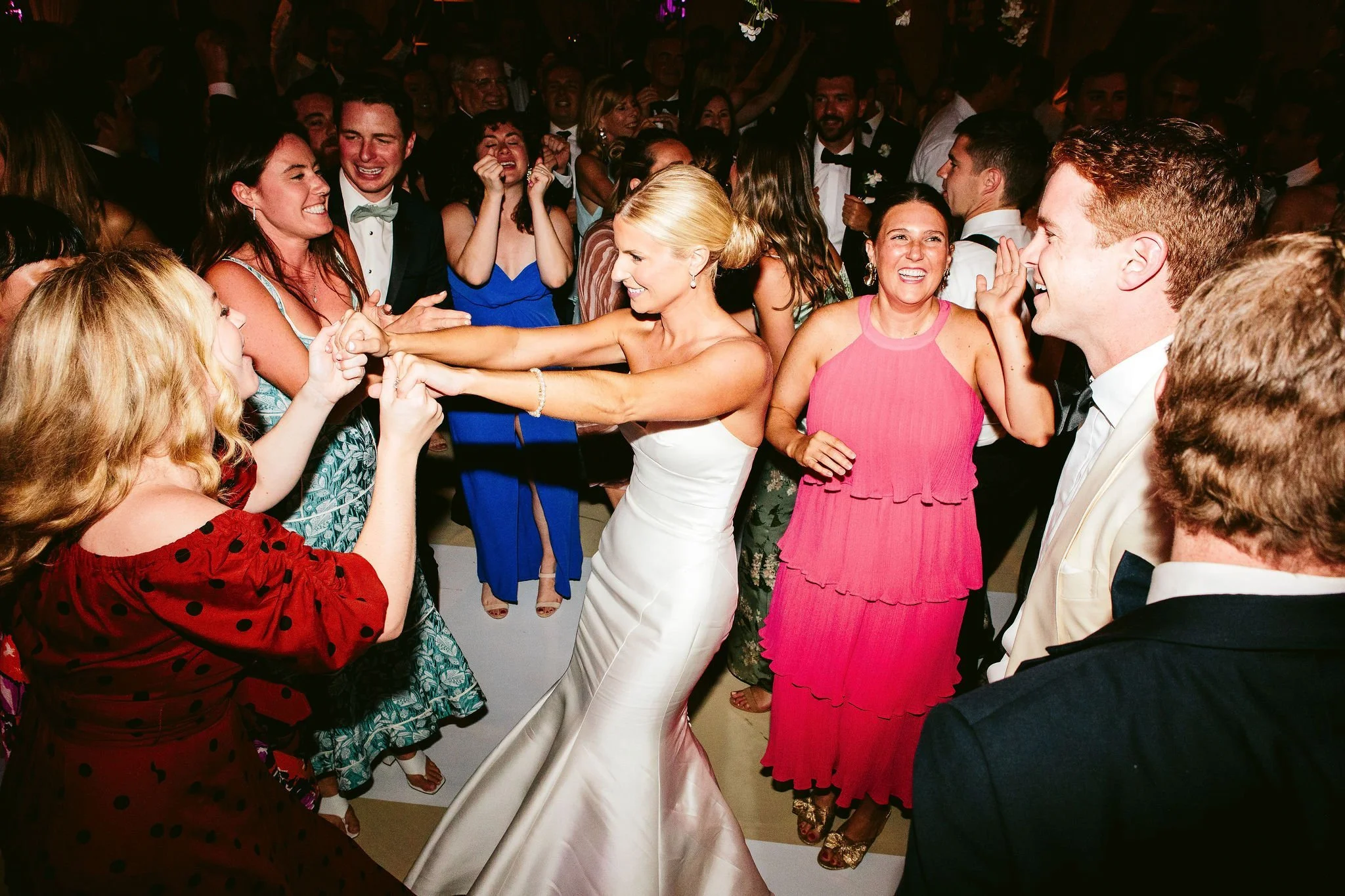 bride dancing at saddle &amp; cycle club wedding