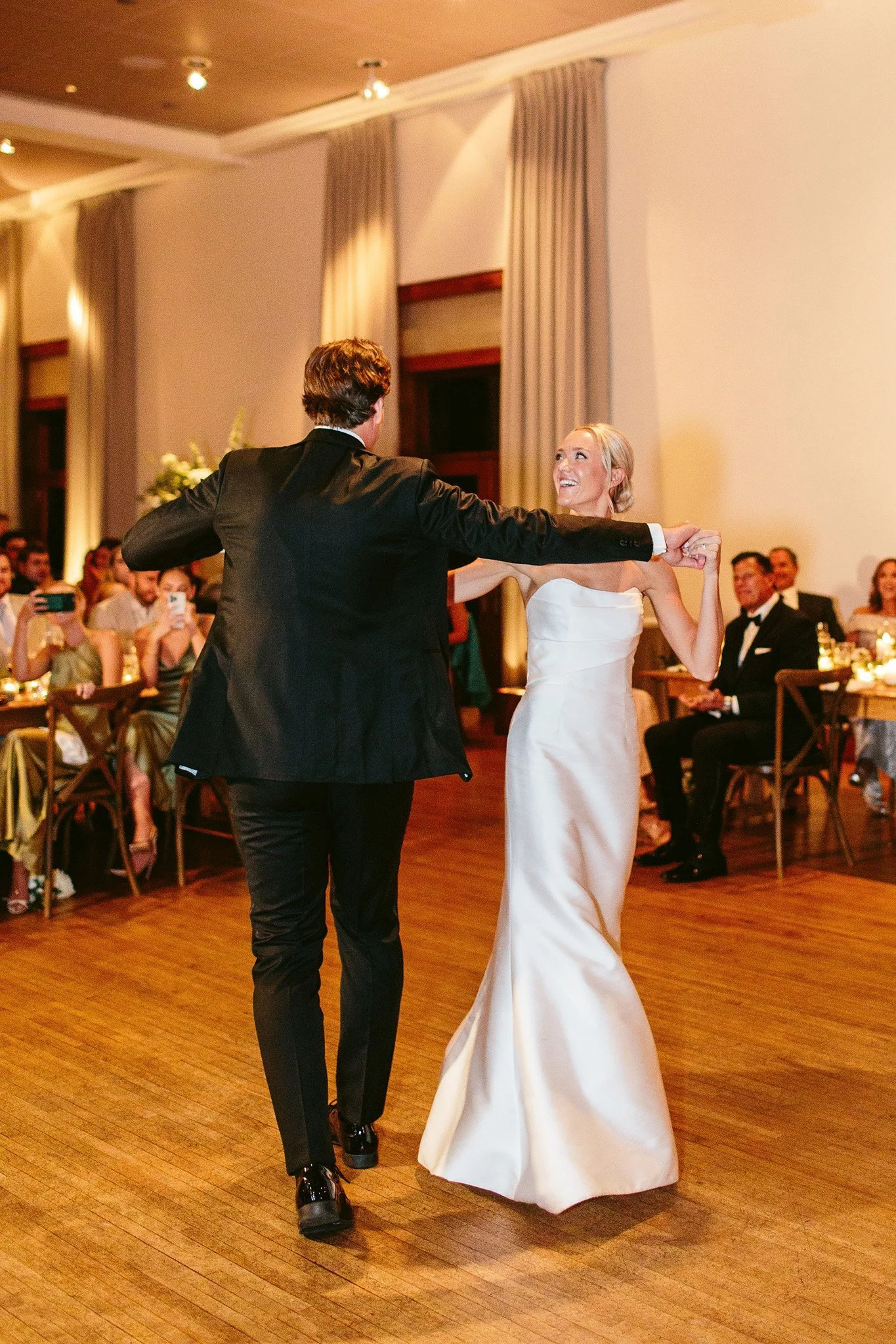 bride and groom dancing at ivy room