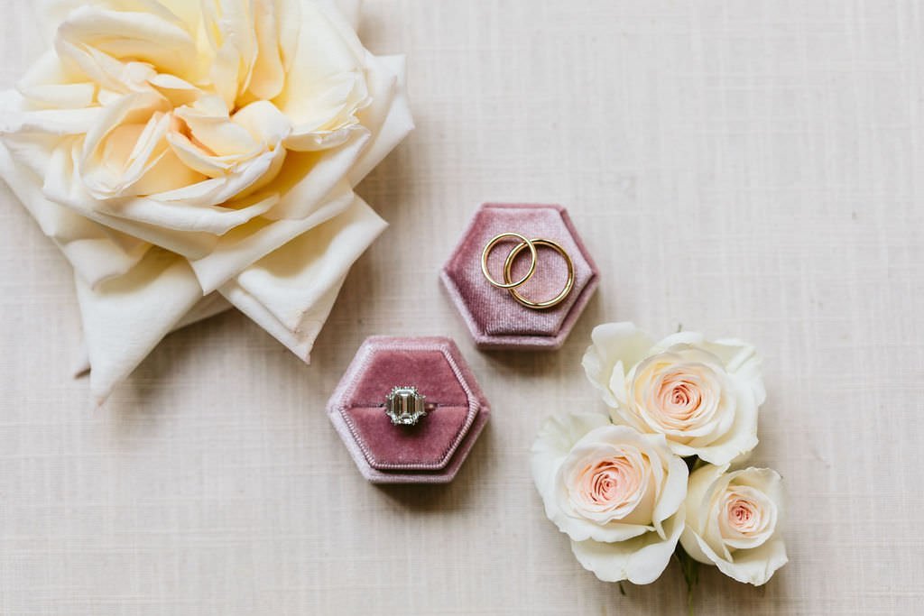 wedding rings in pink ring box