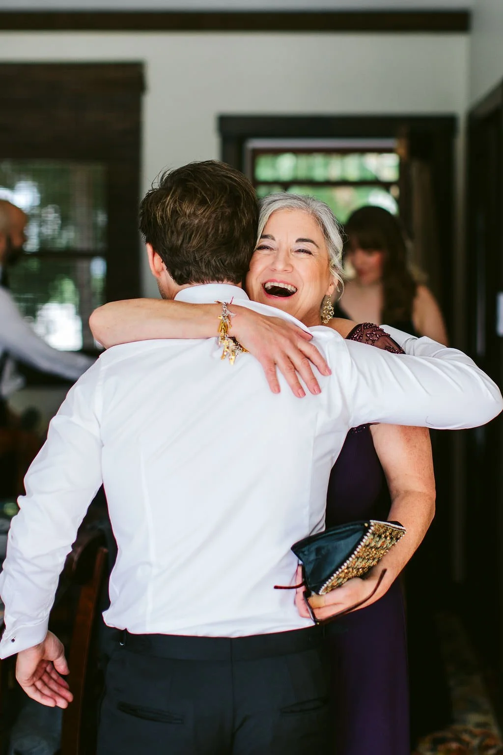 mother seeing groom on wedding day