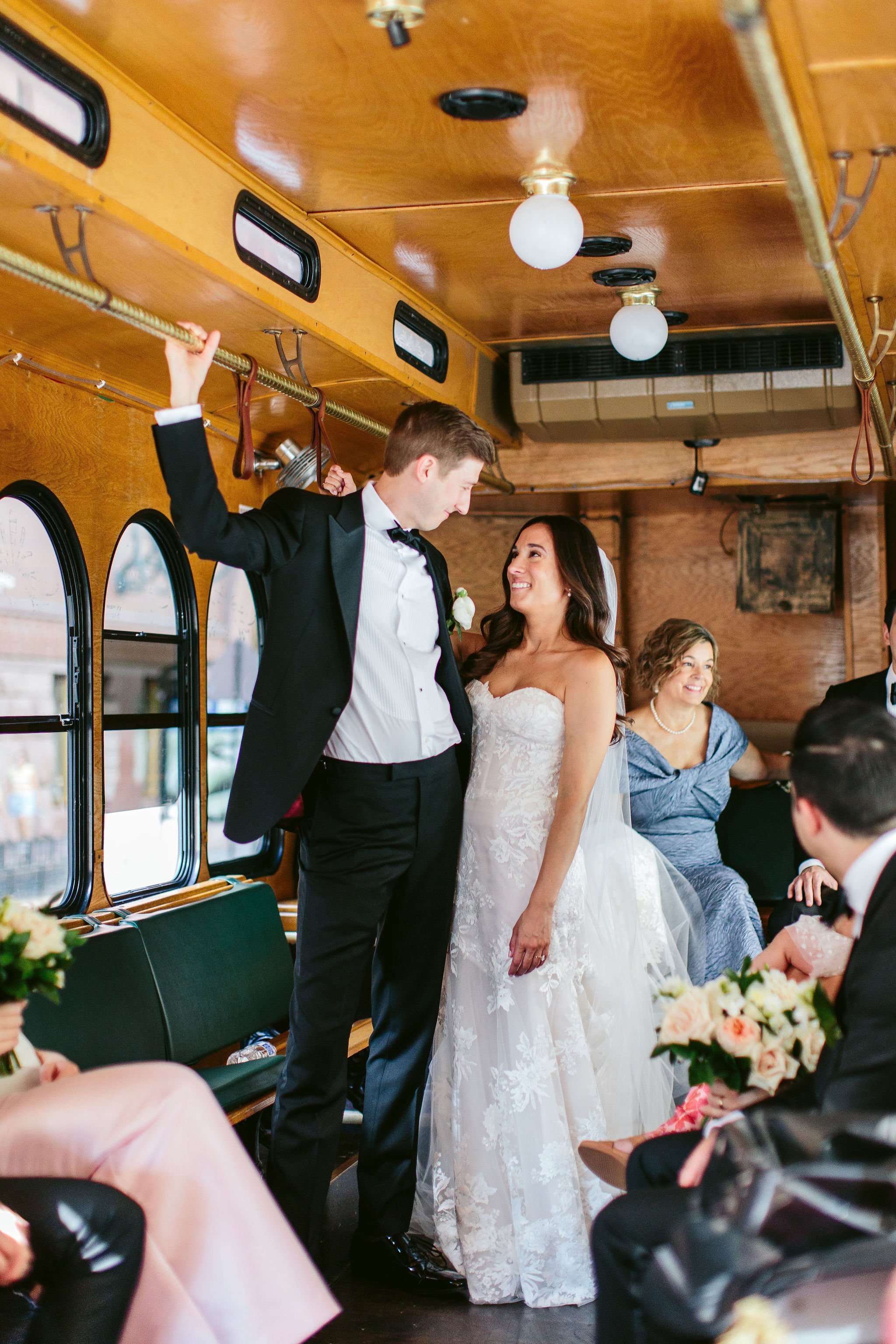 bride and groom on trolley
