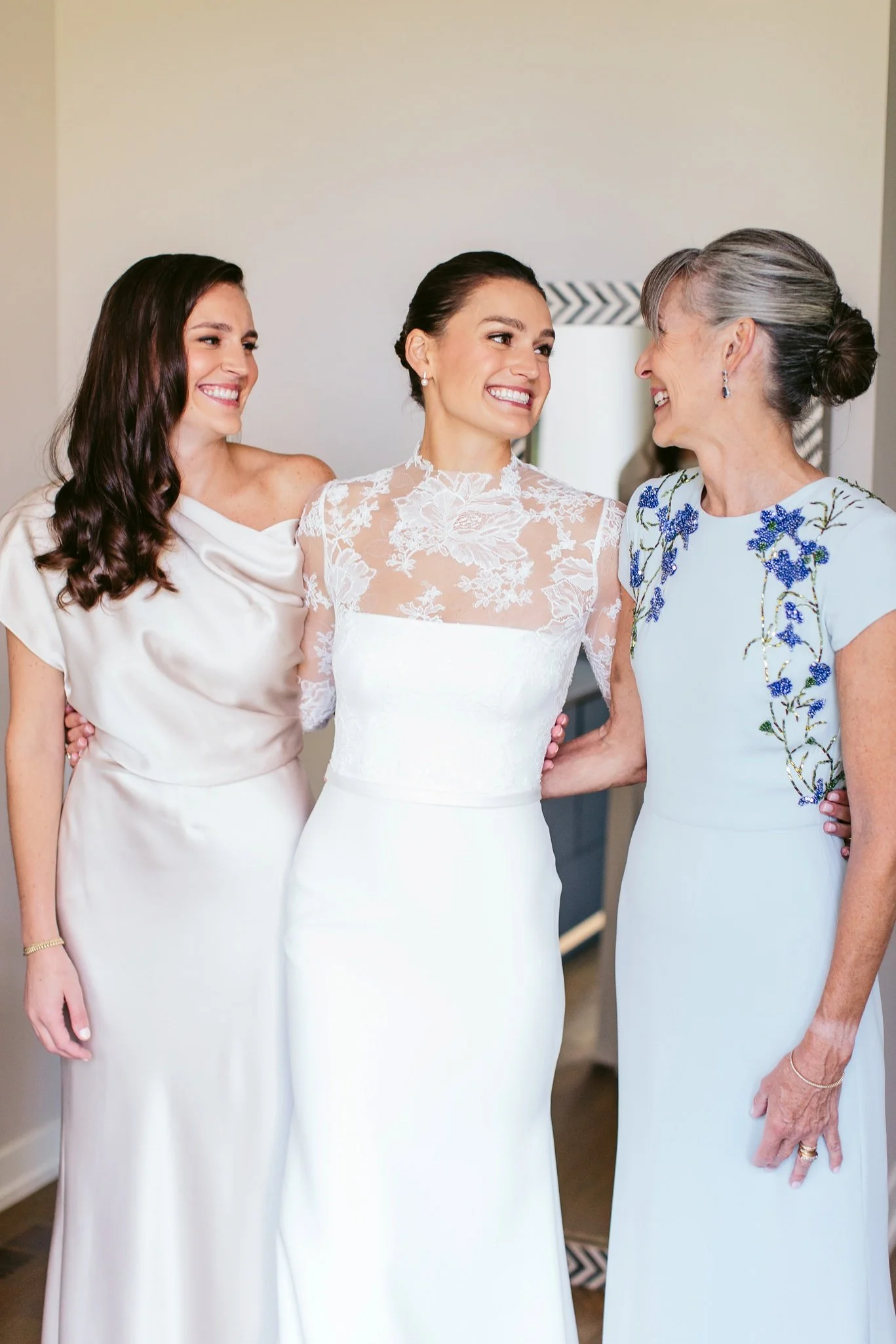 bride with family on wedding morning
