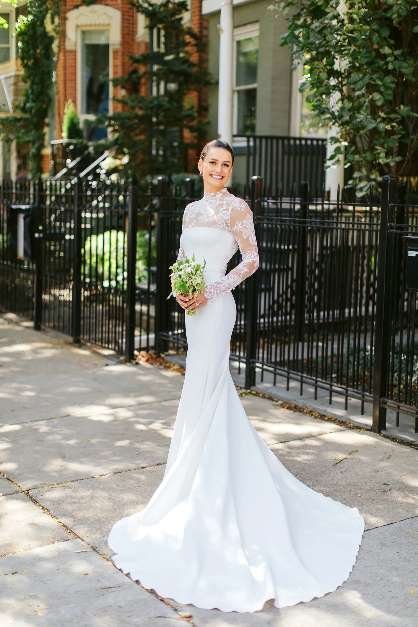 bride with long sleeved wedding dress