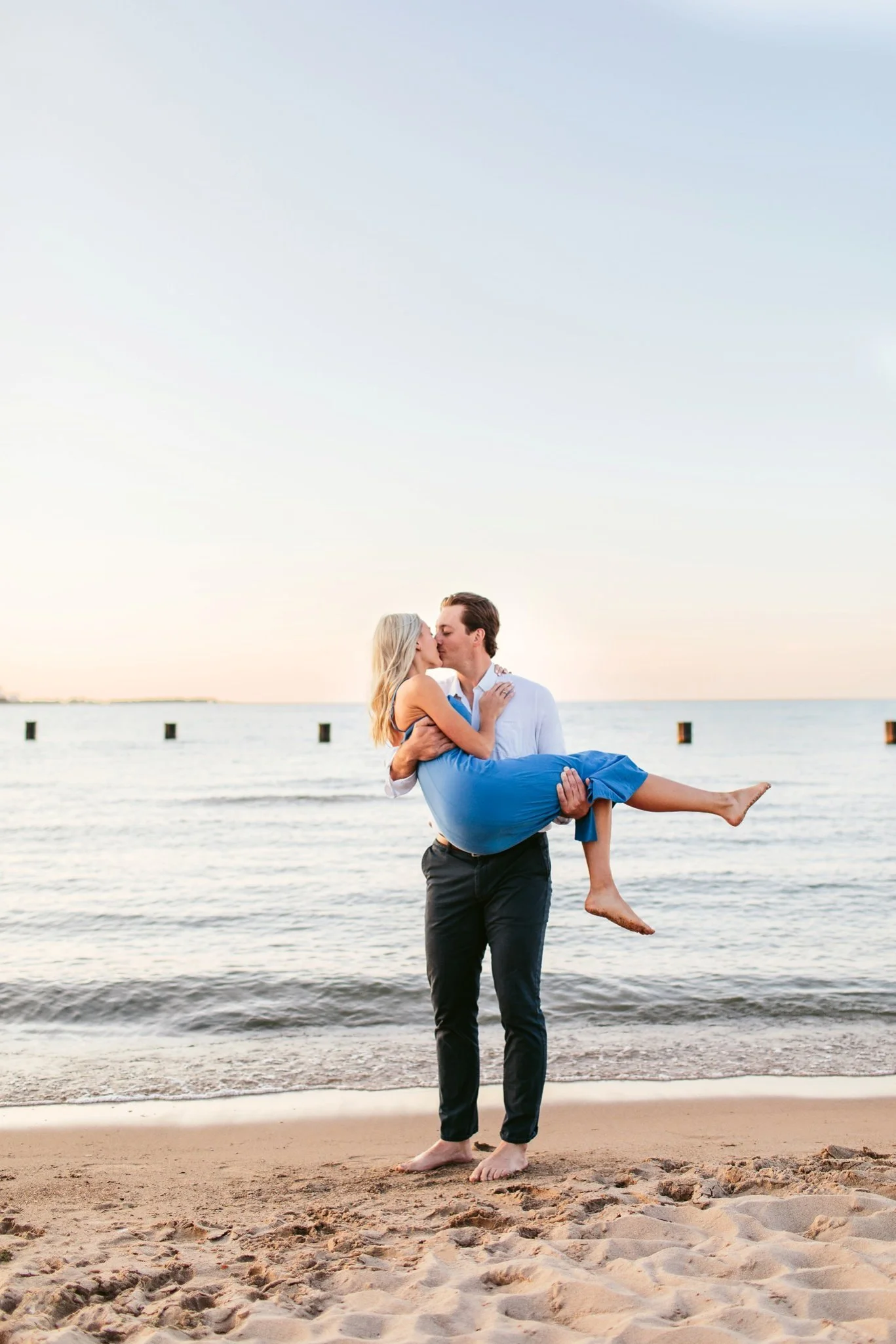 sunset on lake michigan engagement session