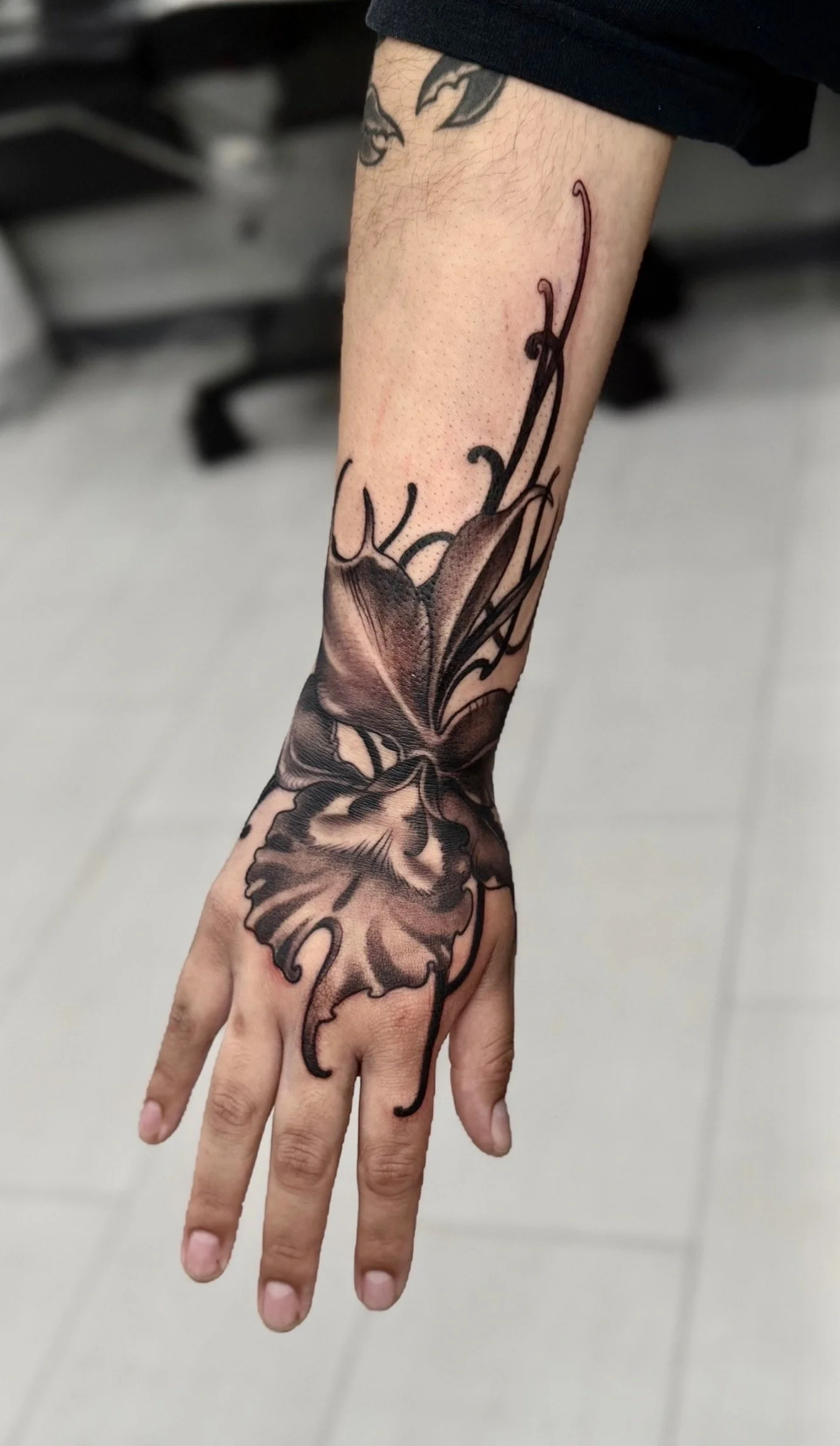 Natalie Orchid Tattoo.JPEG