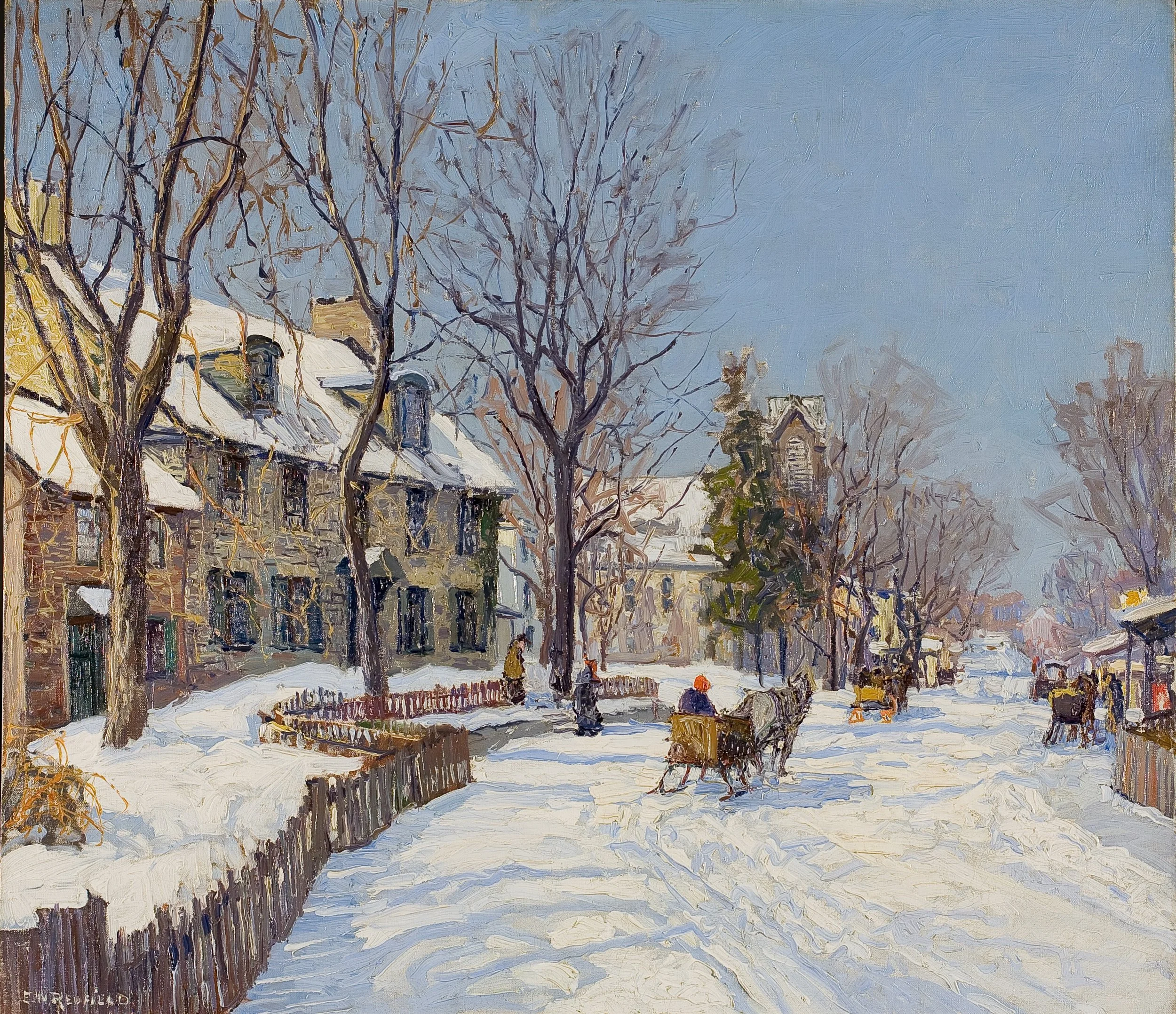 This is an image of Redfield, Edward W. - Sleigh Bells ca. 1920. It is a street scene of a winter day. There are carriages traveling down the road and you can see a snow covered residence.