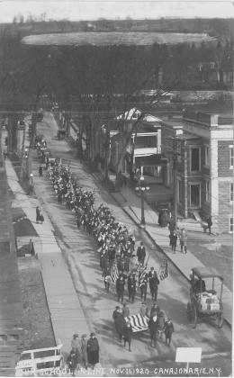 Black and white photo of people at a parade