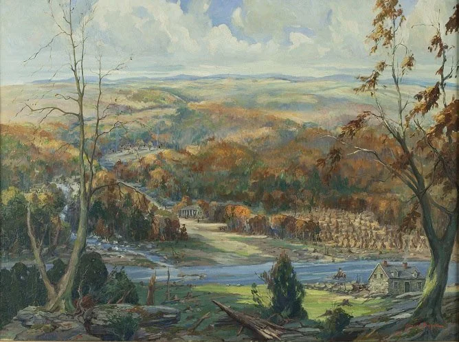 Landscape of a river valley. The surrounding hills are in autumn colors.