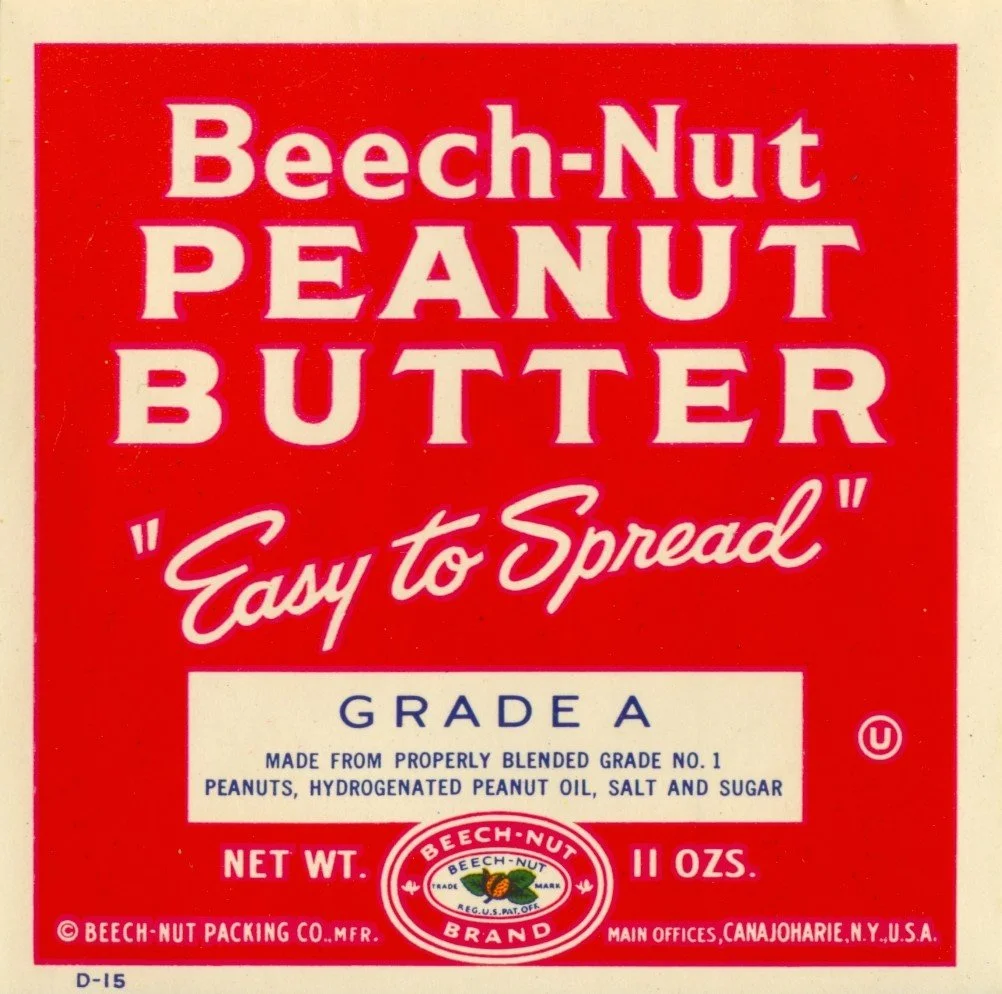 Red and white Beech-Nut peanut butter label. Reads: Beech-Nut Peanut Butter easy to spread grade a. 
