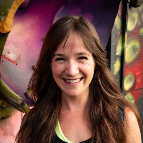 This is an image of board vice president Sam Jacksland. She has an expressive smile and has brown hair.