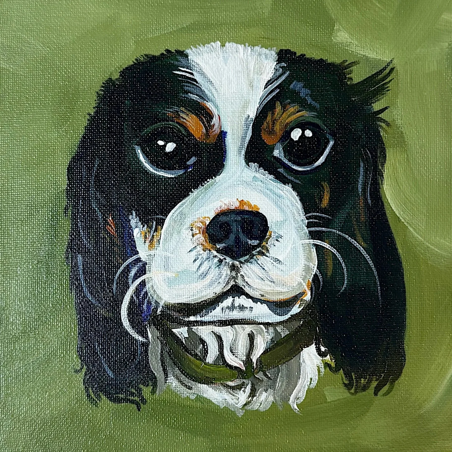 Close-up of a portrait of a black and white dog painted with oil or acrylic paint on a textured canvas, with a green background.