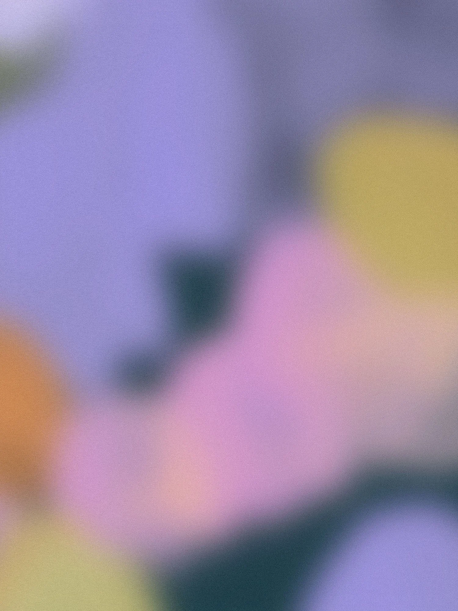 Grainy pastel gradient of lavender, peach, and soft yellow tones creating a calming, atmospheric background.