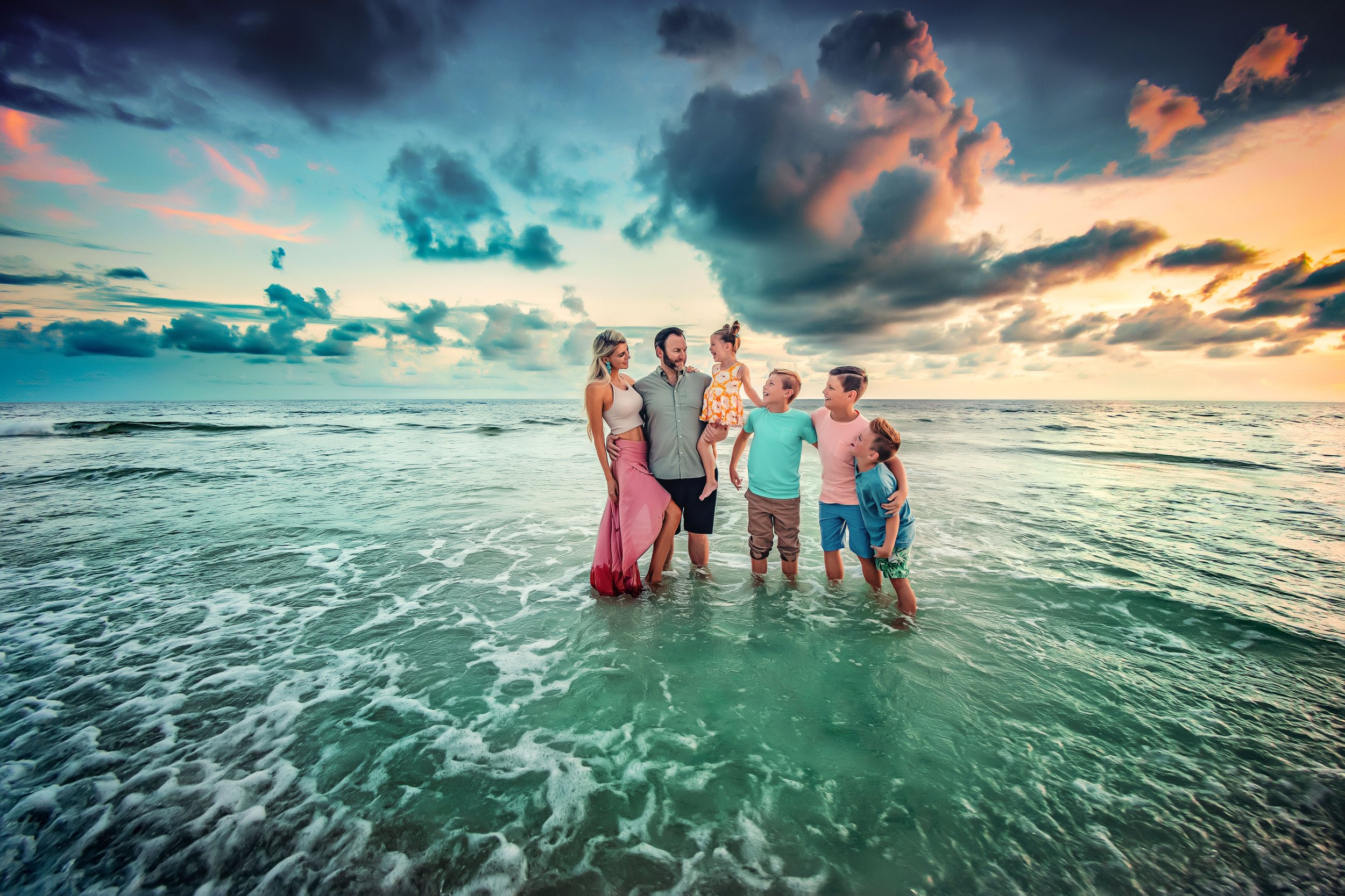 Family of 6 in the gulf water during their Rosemary Beach Family Beach Session
