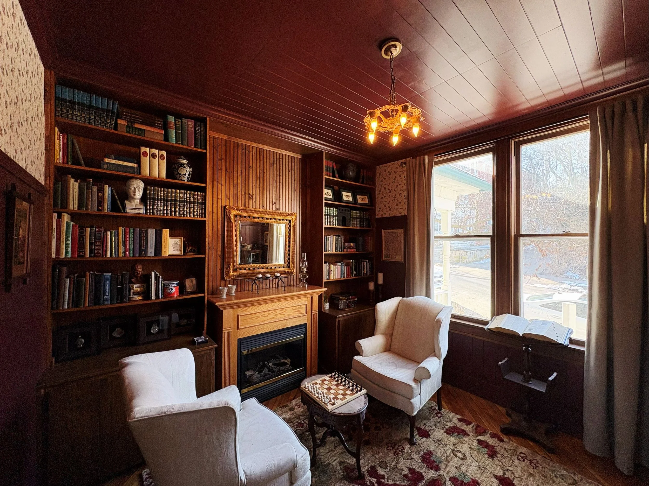 Cozy and Romantic Library with Fireplace and games.jpg